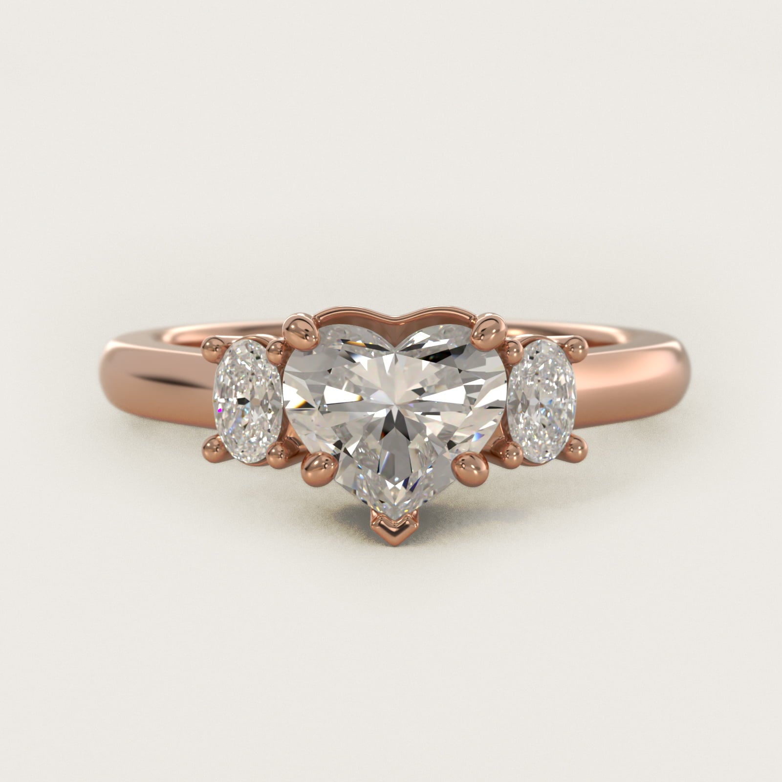 Oval Three-Stone Diamond Engagement Ring in 18k Rose Gold (1/3 ct. tw.) - Heart Center