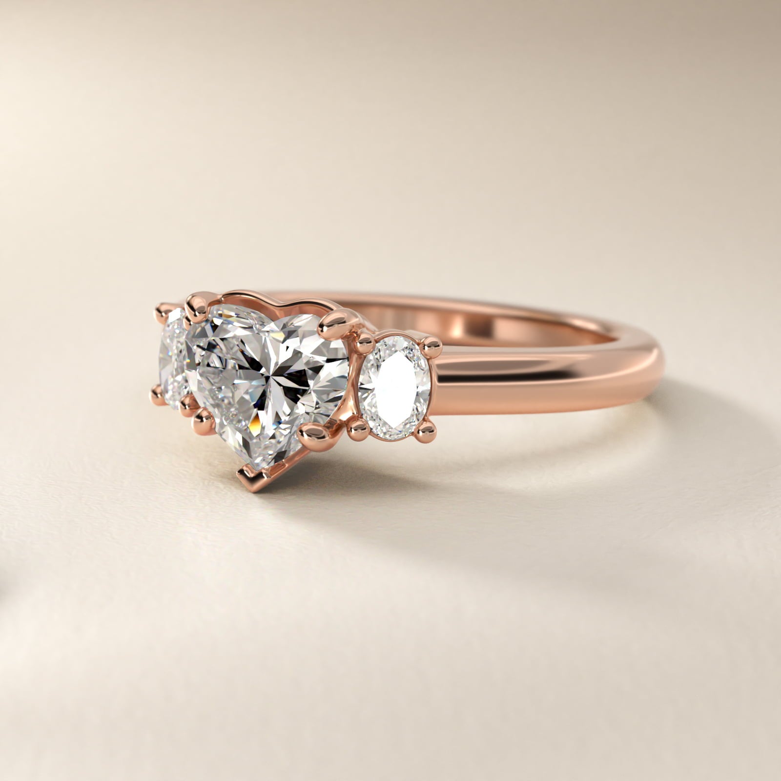 Oval Three-Stone Diamond Engagement Ring in 14k Rose Gold (1/3 ct. tw.) - Heart Center