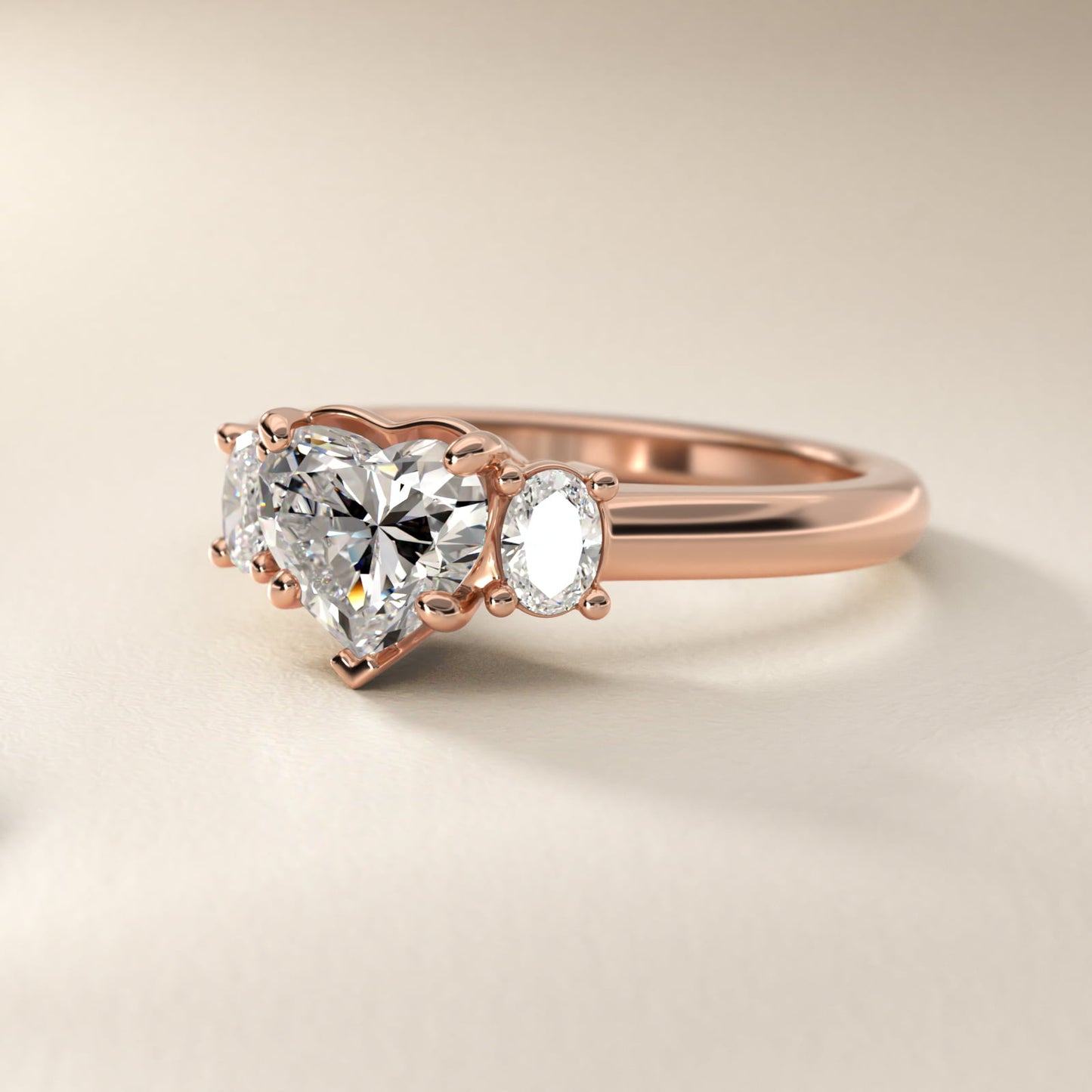 Oval Three-Stone Diamond Engagement Ring in 18k Rose Gold (1/3 ct. tw.) - Heart Center