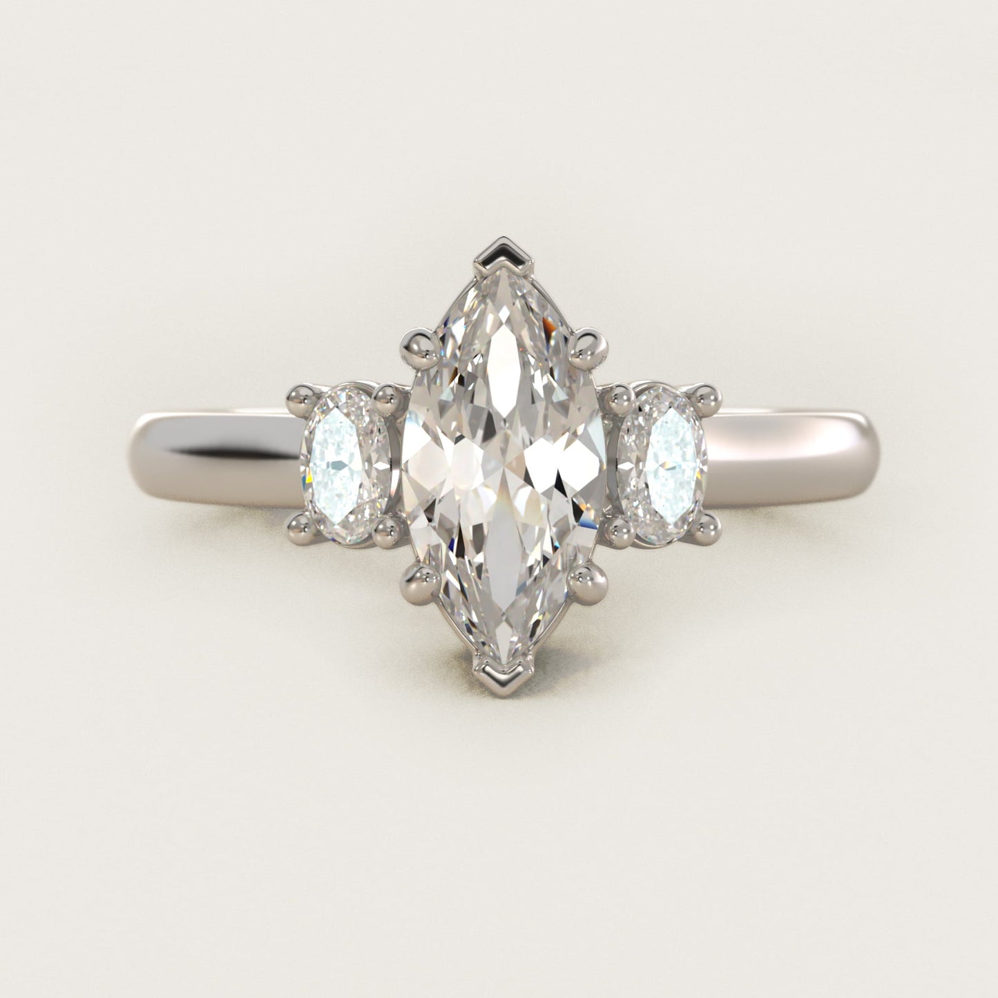 Oval Three-Stone Diamond Engagement Ring in Platinum (1/3 ct. tw.) - Marquise Center