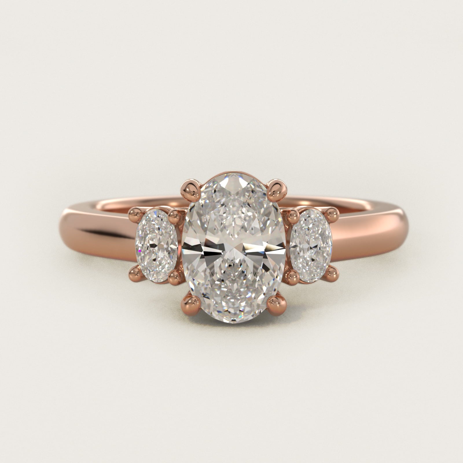 Oval Three-Stone Diamond Engagement Ring in 14k Rose Gold (1/3 ct. tw.) - Oval Center