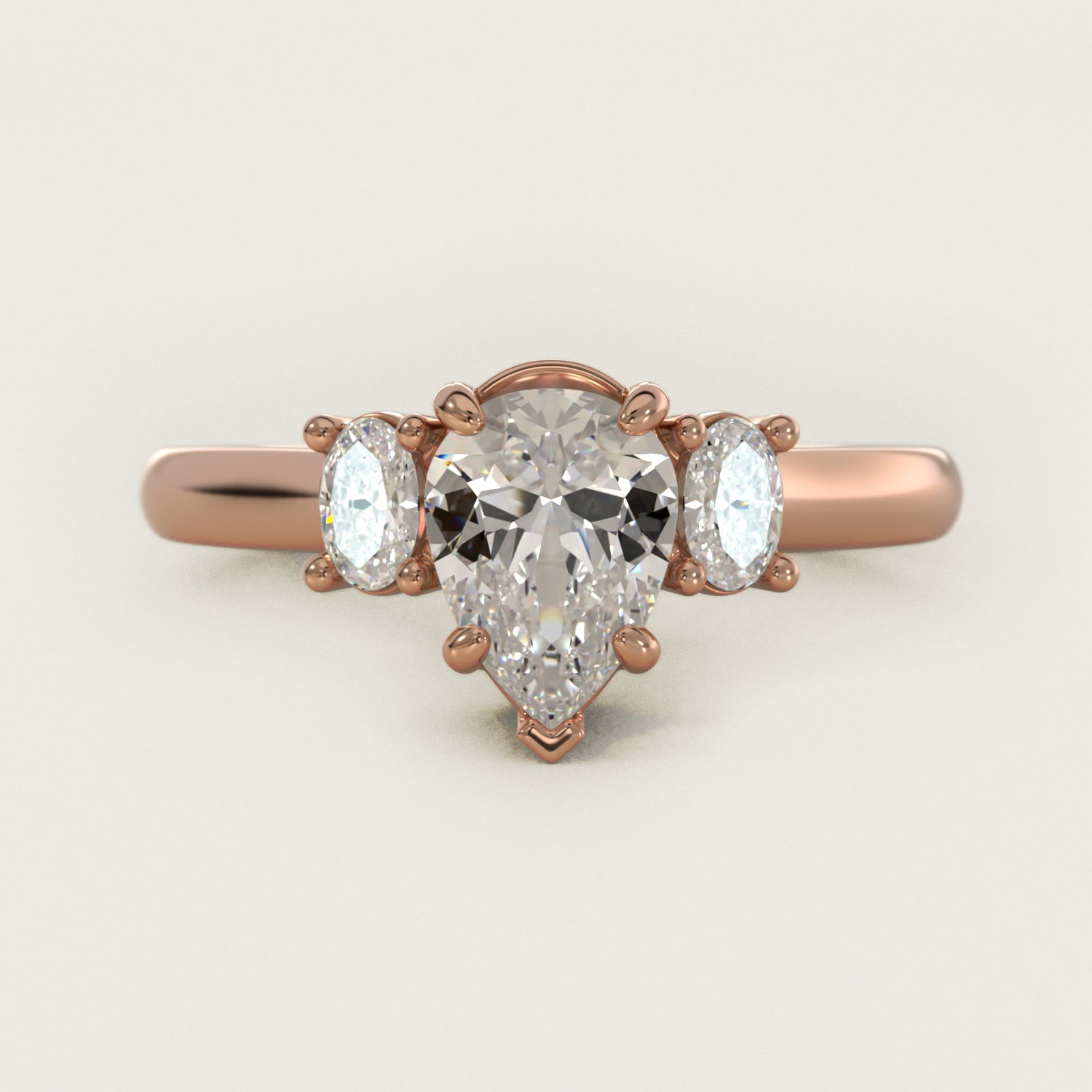 Oval Three-Stone Diamond Engagement Ring in 14k Rose Gold (1/3 ct. tw.) - Pear Center