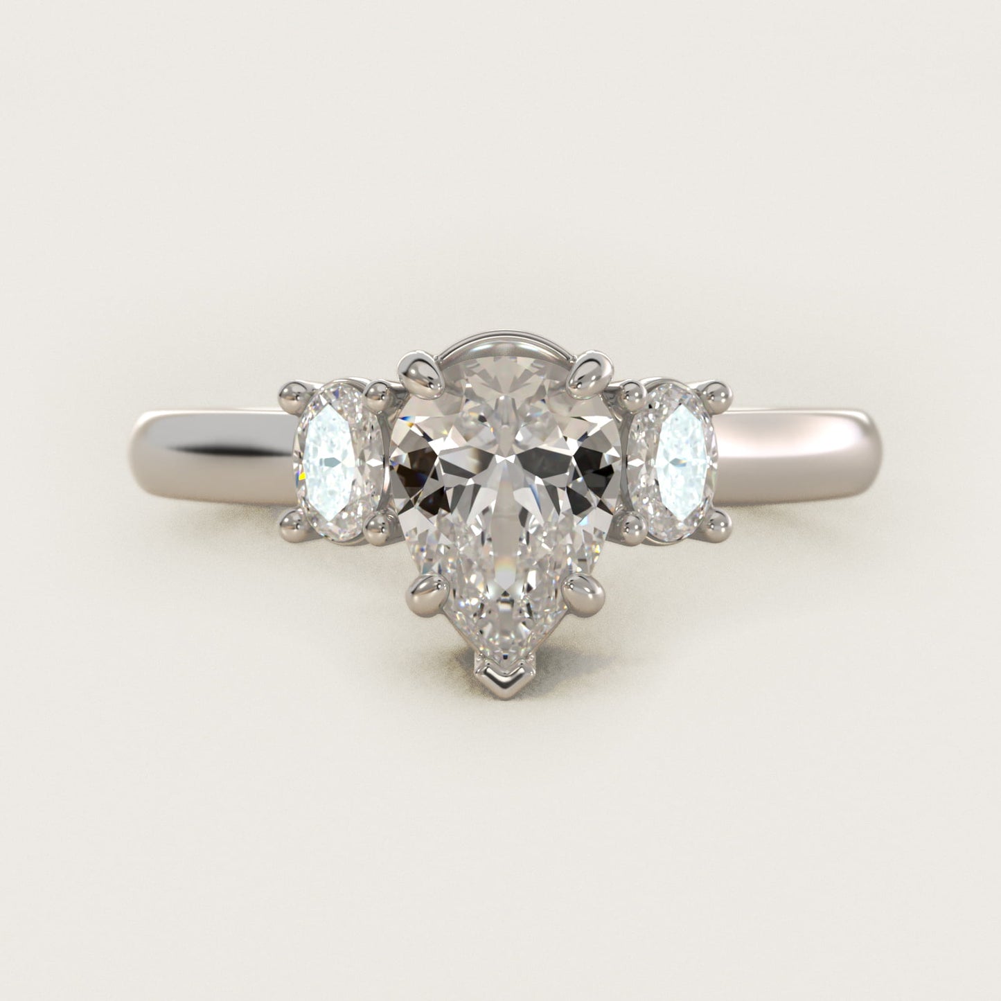Oval Three-Stone Diamond Engagement Ring in 18k White Gold (1/3 ct. tw.) - Pear Center