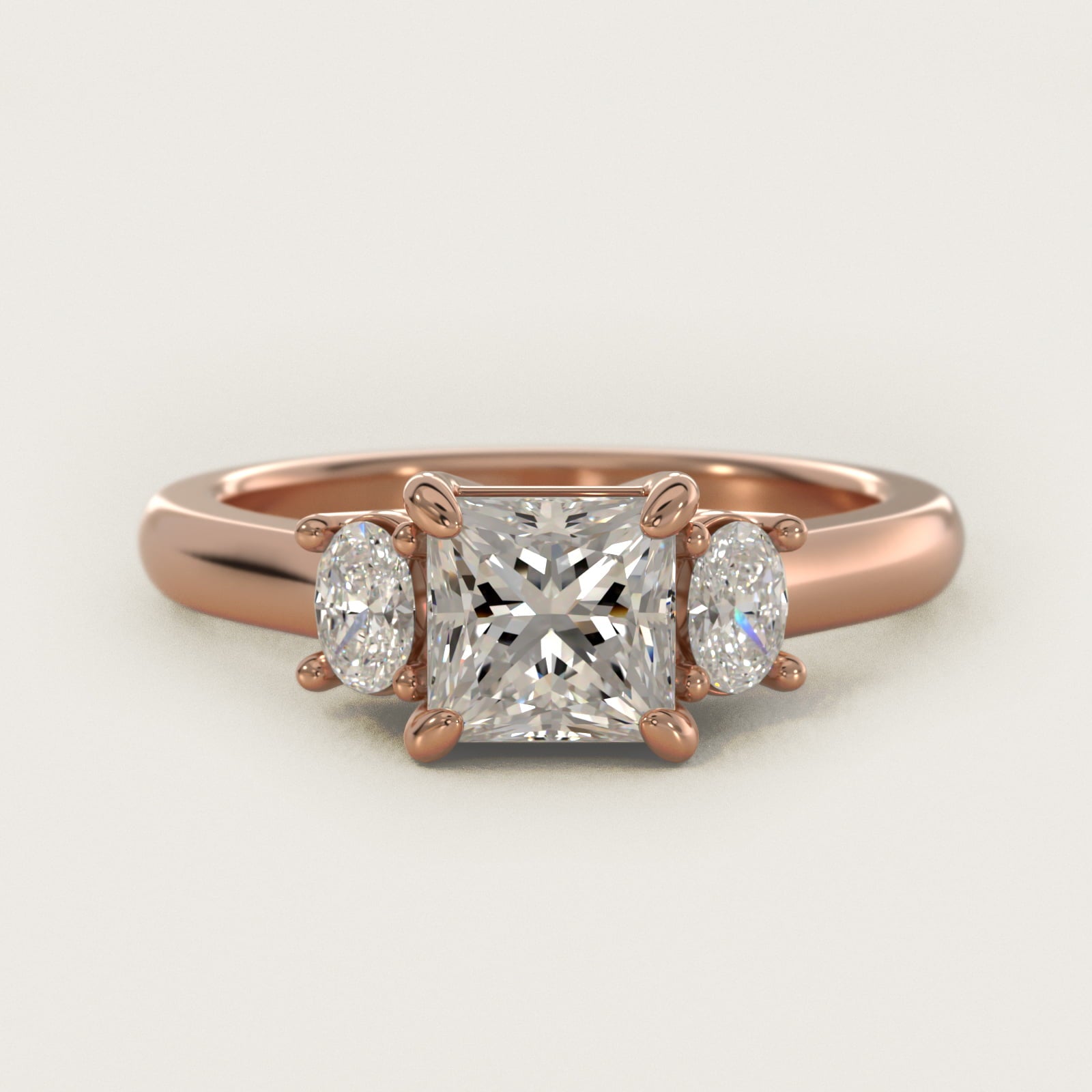 Oval Three-Stone Diamond Engagement Ring in 18k Rose Gold (1/3 ct. tw.) - Princess Center