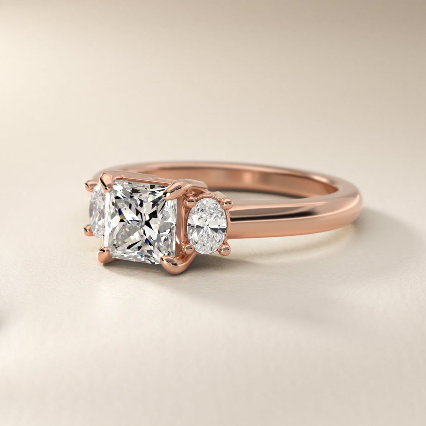 Oval Three-Stone Diamond Engagement Ring in 14k Rose Gold (1/3 ct. tw.) - Princess Center