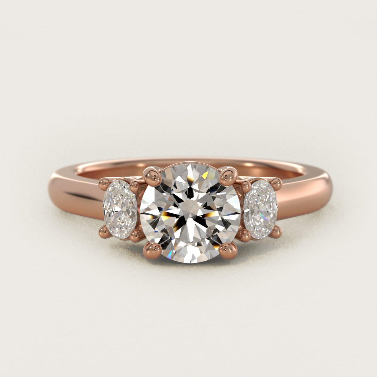 Oval Three-Stone Diamond Engagement Ring in 18k Rose Gold (1/3 ct. tw.) - Round Center
