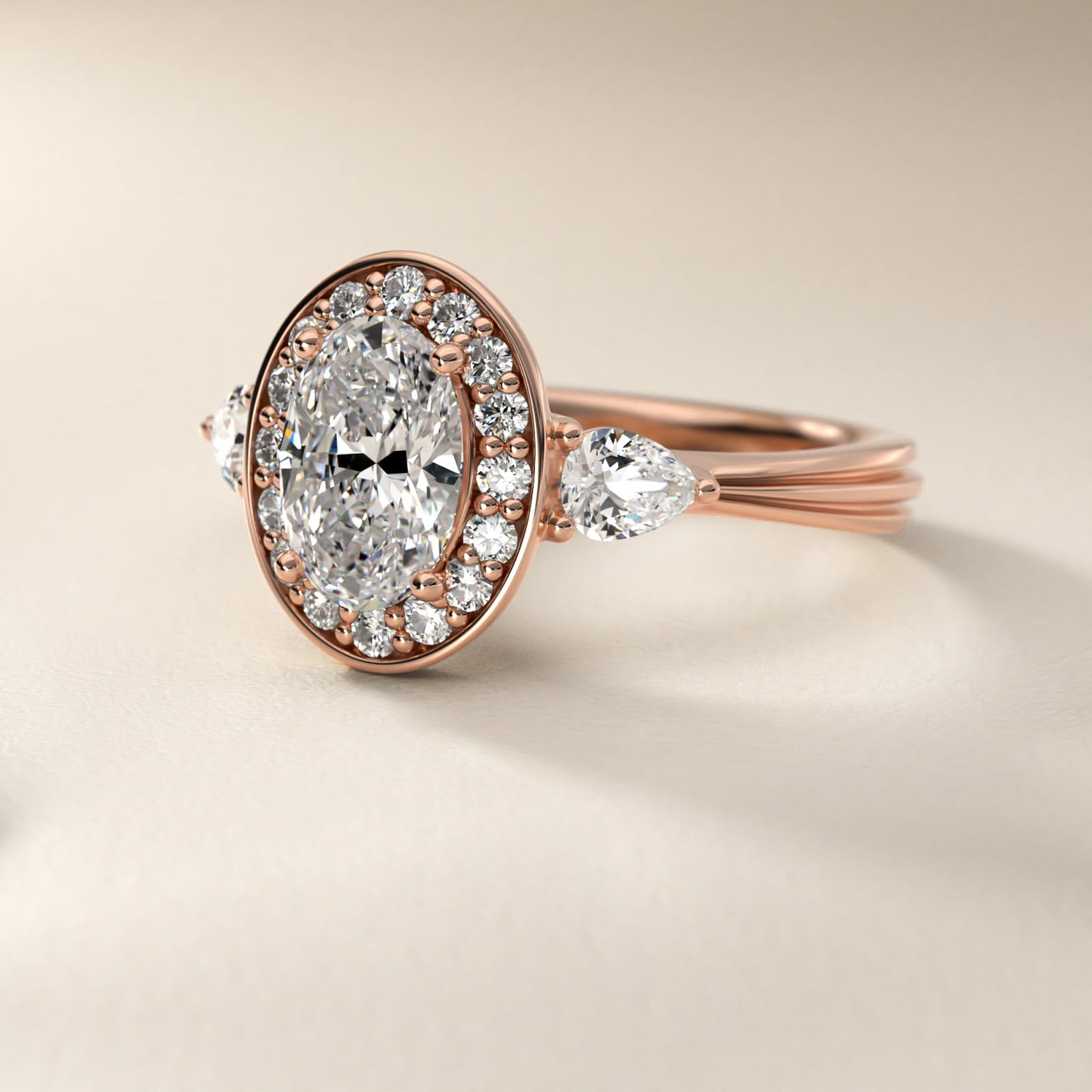 Pear Shape Side Stone Diamond Halo Engagement Ring In 14K Rose Gold By James Allen - Oval Center