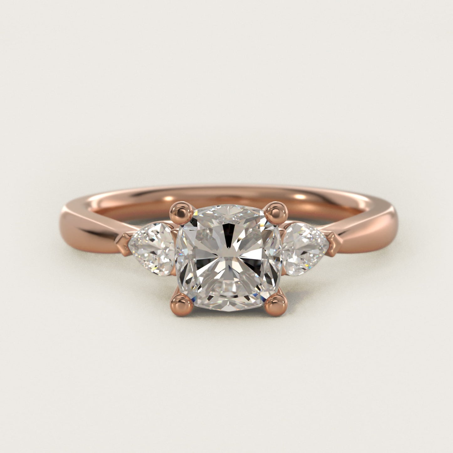 Pear Sidestone Diamond Engagement Ring in 18k Rose Gold (1/4 ct. tw.) - Cushion Center