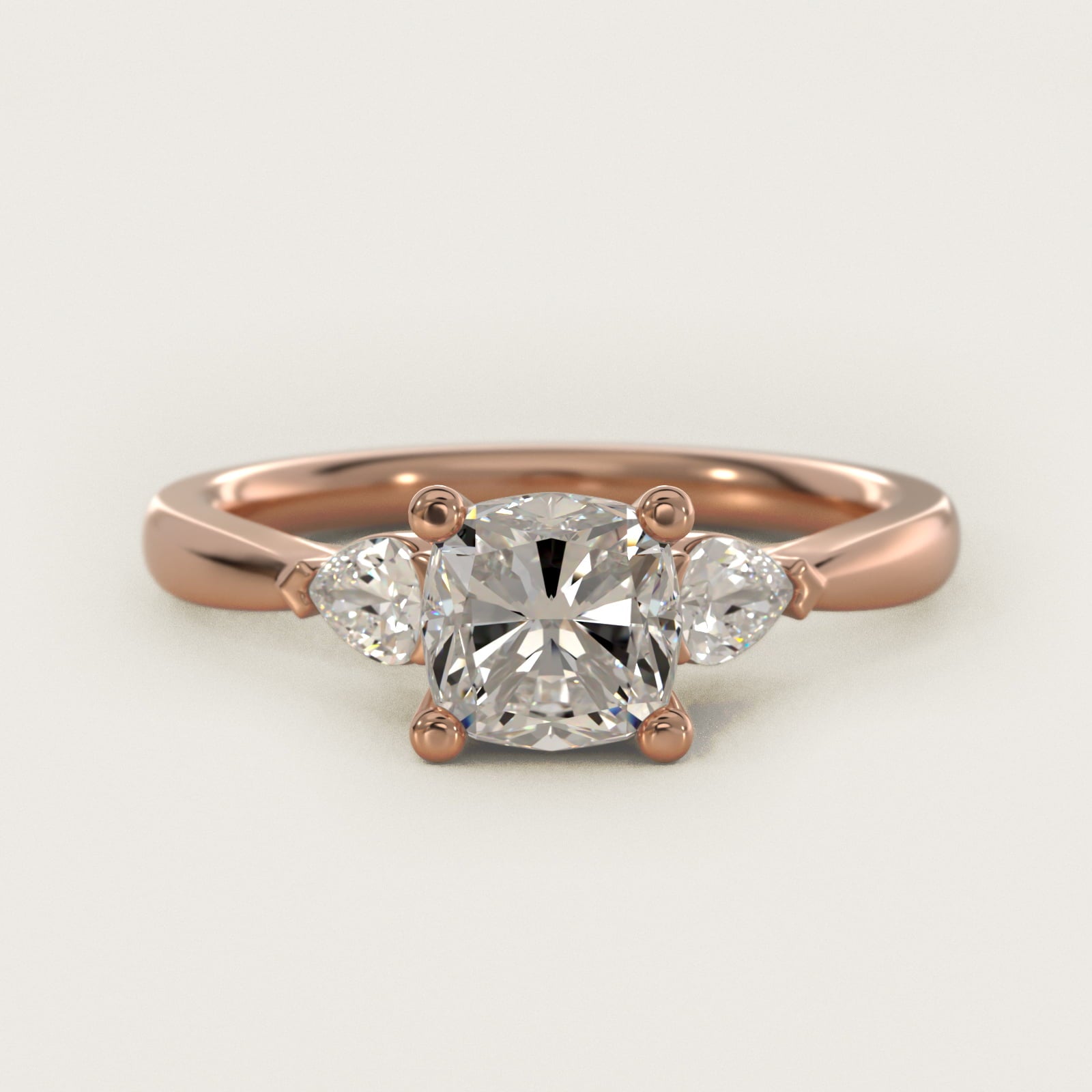 Pear Sidestone Diamond Engagement Ring in 18k Rose Gold (1/4 ct. tw.) - Cushion Center