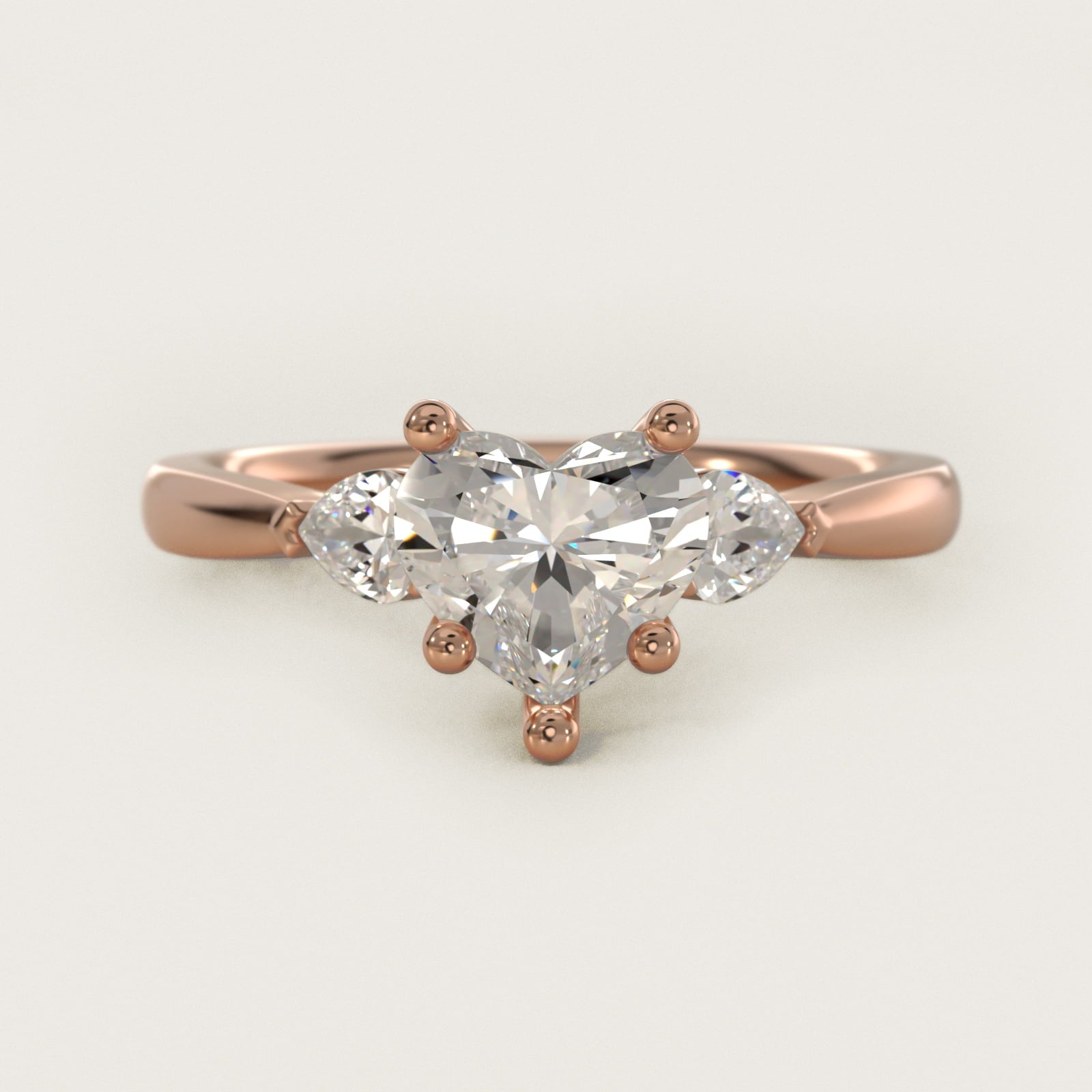 Pear Sidestone Diamond Engagement Ring in 14k Rose Gold (1/4 ct. tw.) - Heart Center