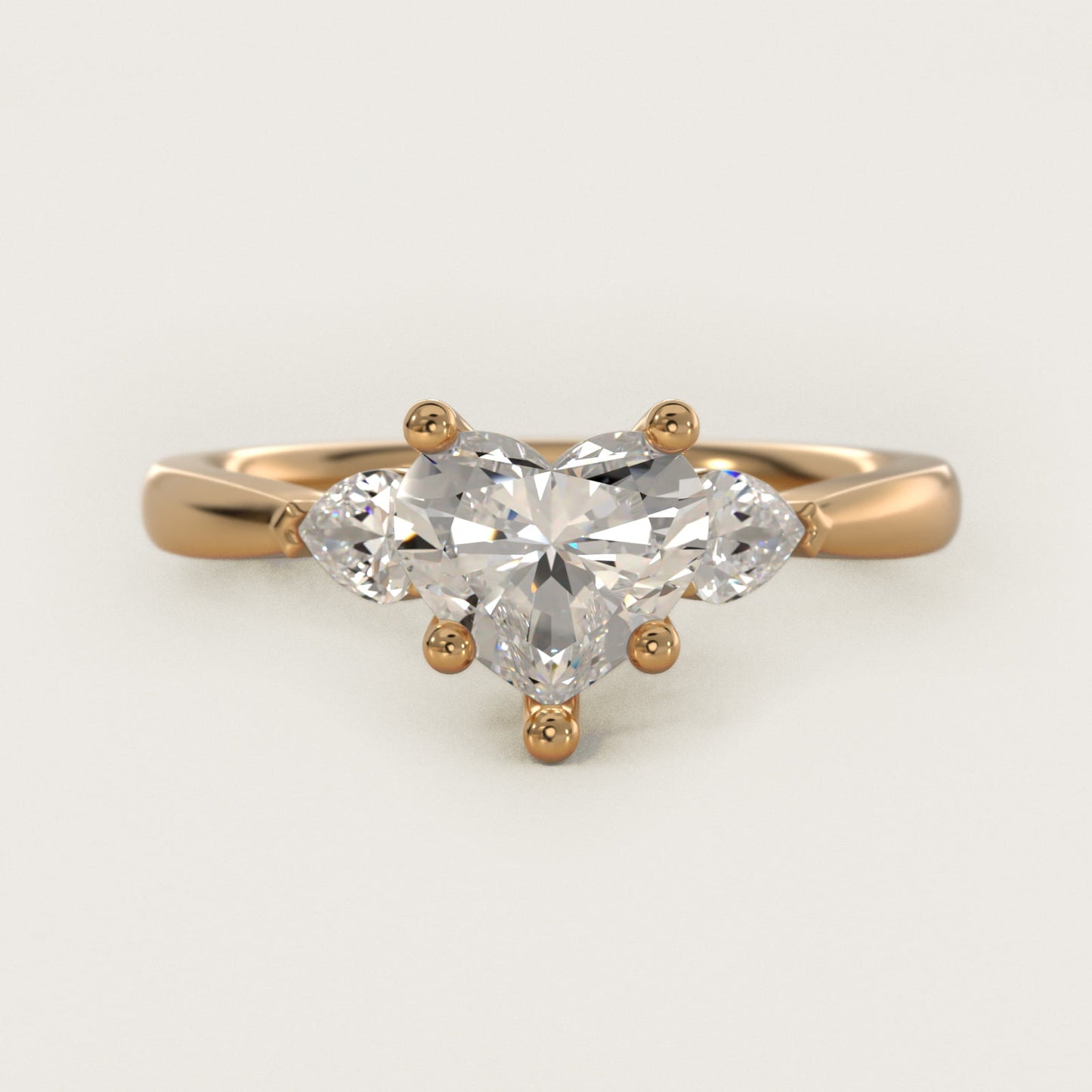Pear Sidestone Diamond Engagement Ring in 14k Yellow Gold (1/4 ct. tw.) - Heart Center