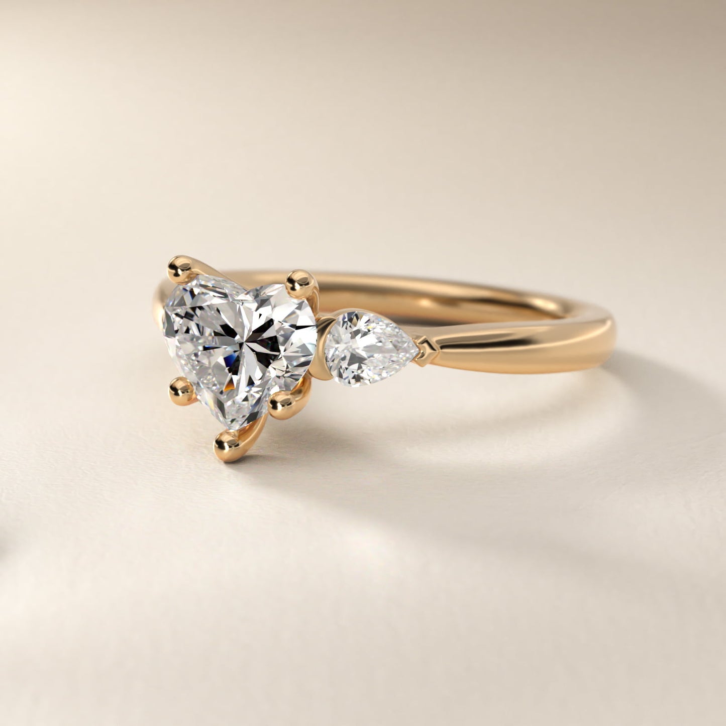 Pear Sidestone Diamond Engagement Ring in 14k Yellow Gold (1/4 ct. tw.) - Heart Center