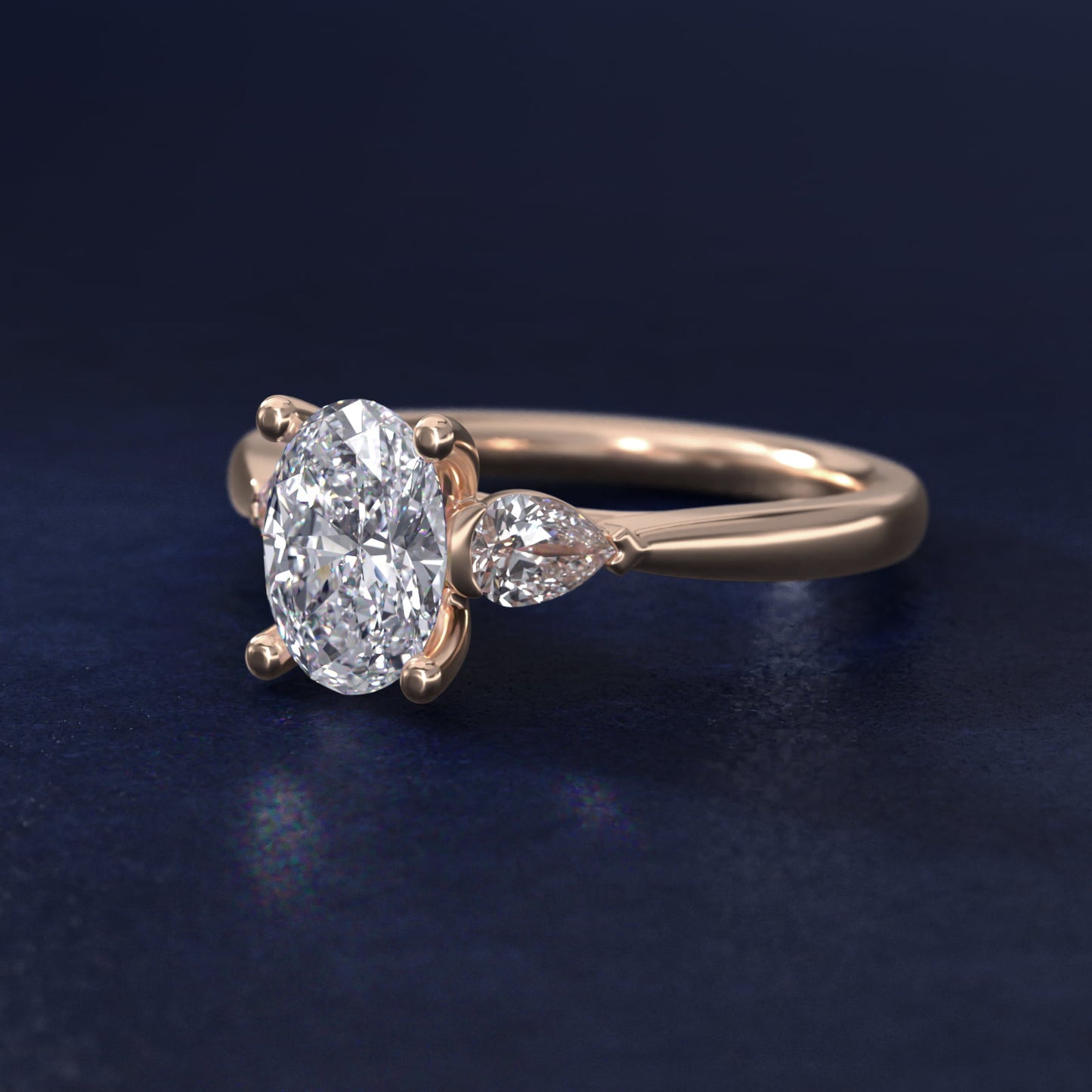 Pear Sidestone Diamond Engagement Ring in 14k Rose Gold (1/4 ct. tw.) - Oval Center