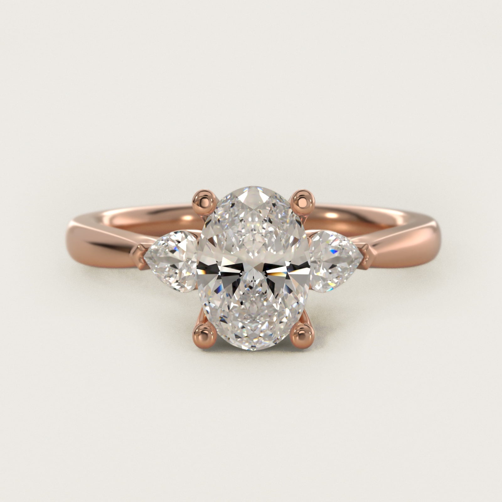 Pear Sidestone Diamond Engagement Ring in 14k Rose Gold (1/4 ct. tw.) - Oval Center