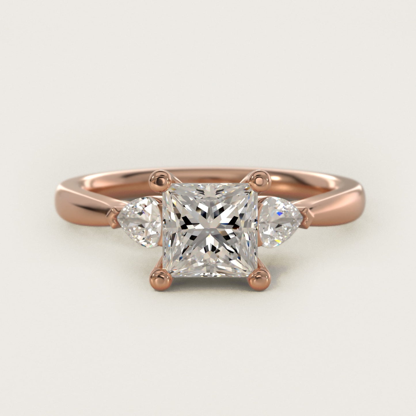 Pear Sidestone Diamond Engagement Ring in 18k Rose Gold (1/4 ct. tw.) - Princess Center