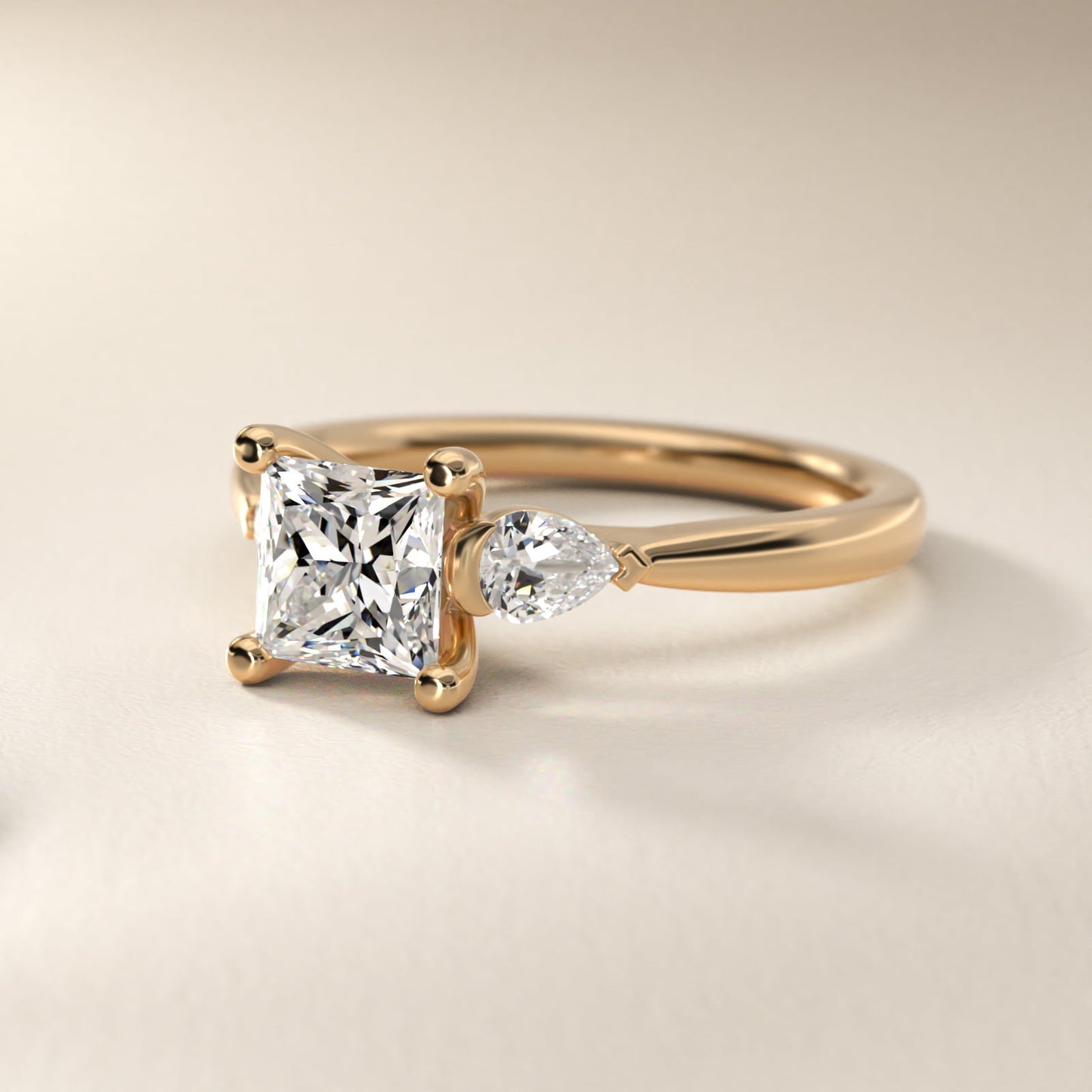 Pear Sidestone Diamond Engagement Ring in 14k Yellow Gold (1/4 ct. tw.) - Princess Center