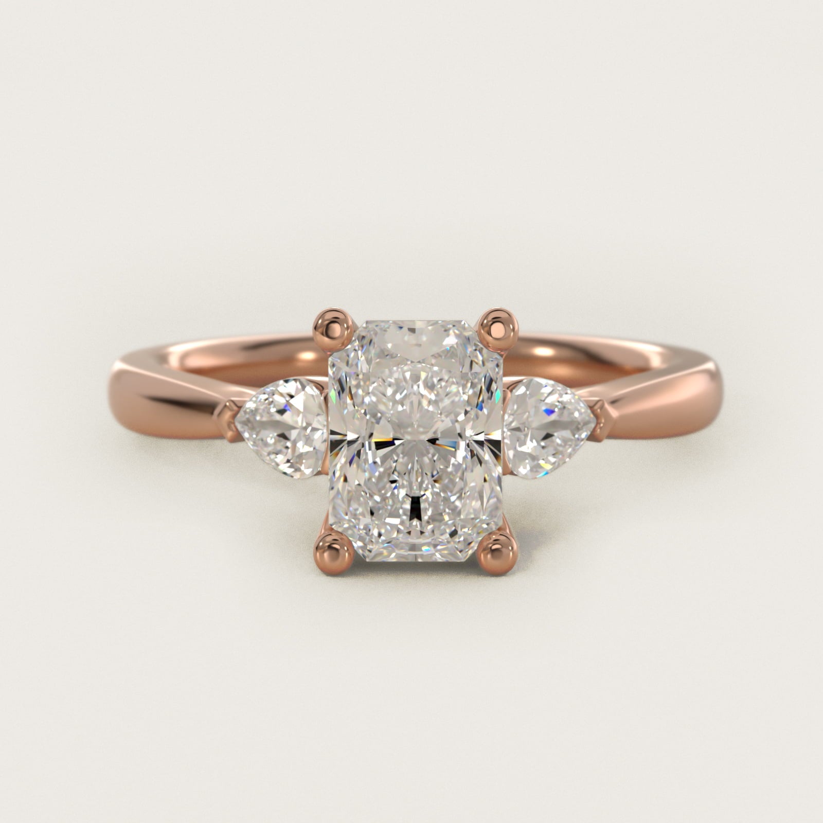 Pear Sidestone Diamond Engagement Ring in 18k Rose Gold (1/4 ct. tw.) - Radiant Center