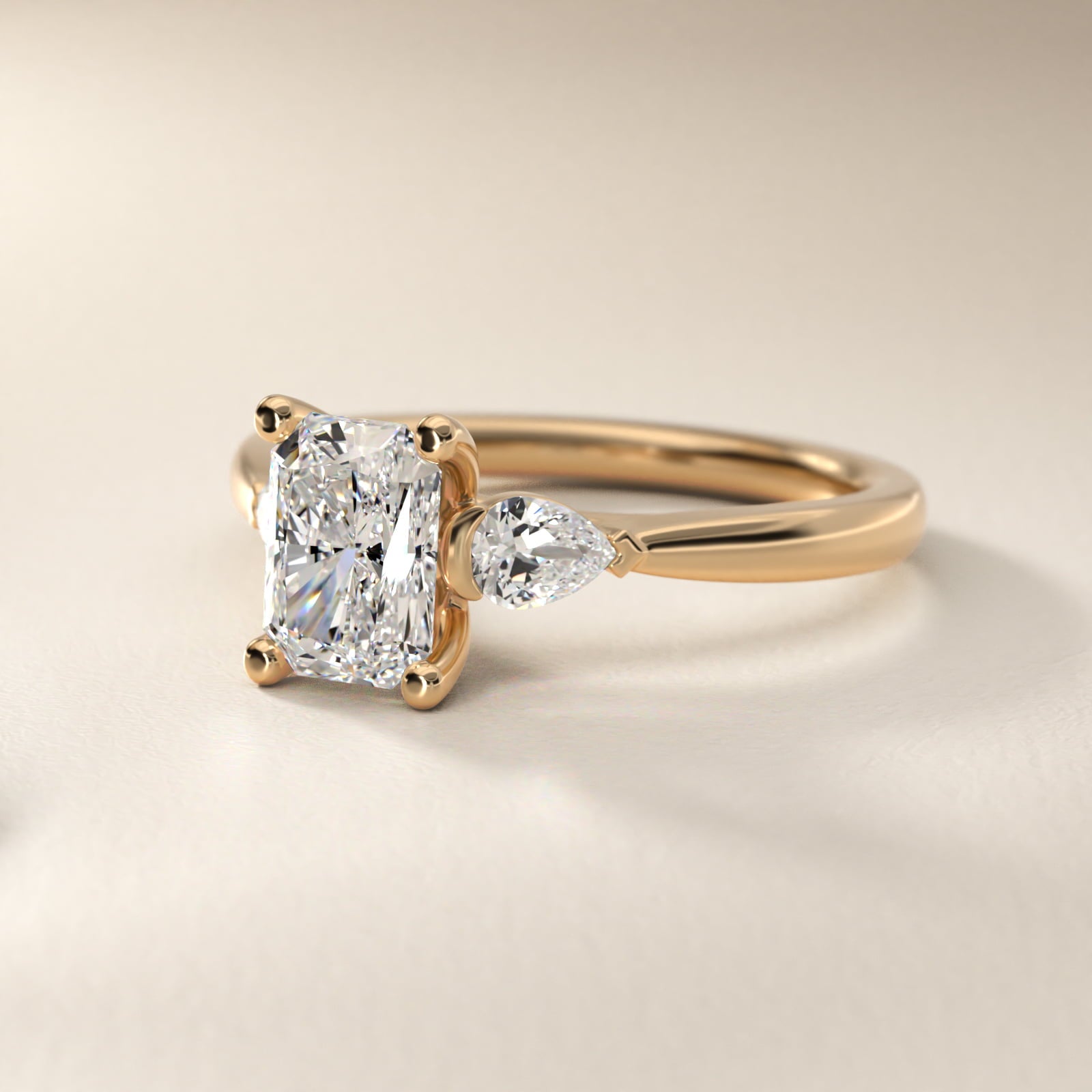 Pear Sidestone Diamond Engagement Ring in 14k Yellow Gold (1/4 ct. tw.) - Radiant Center
