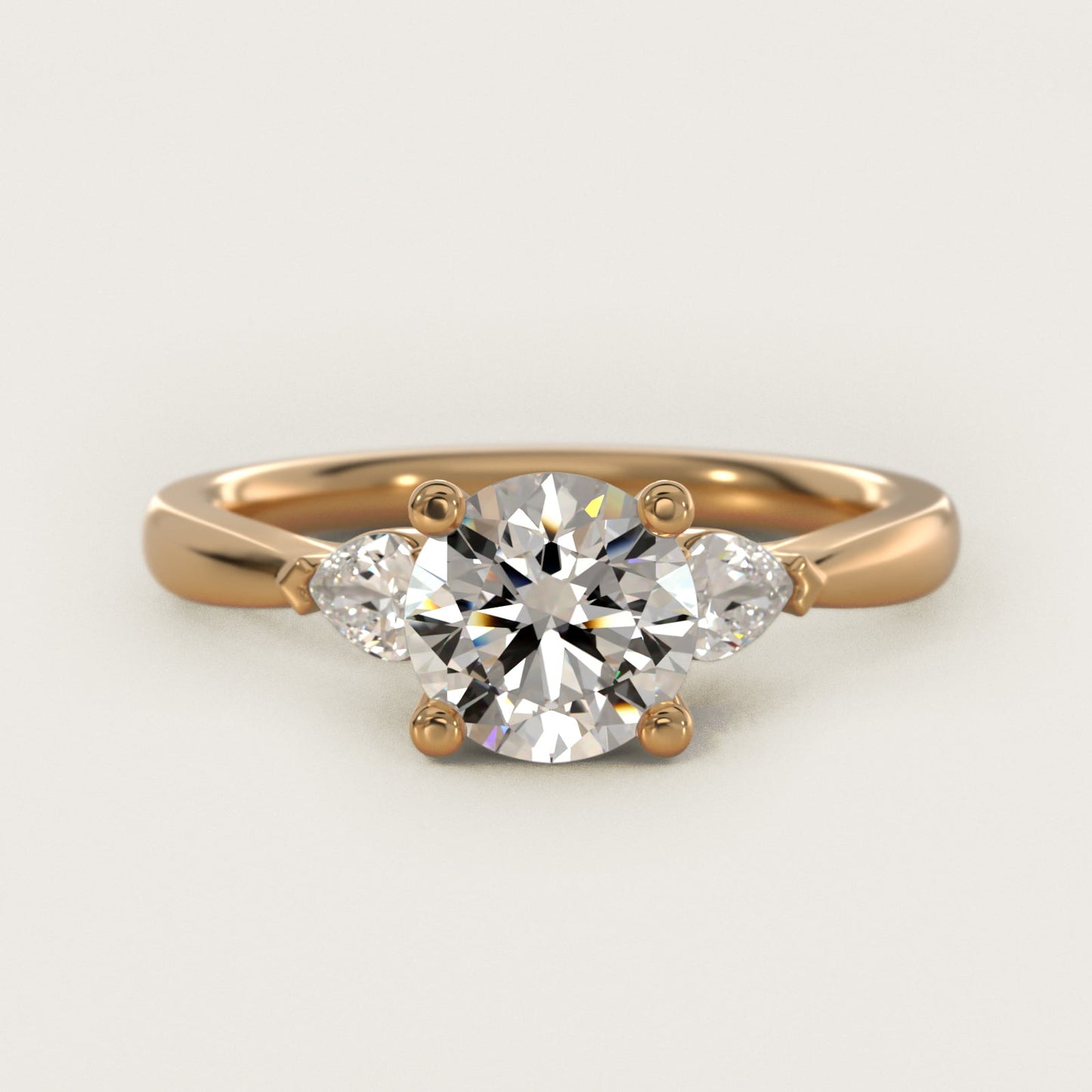 Pear Sidestone Diamond Engagement Ring in 14k Yellow Gold (1/4 ct. tw.) - Round Center