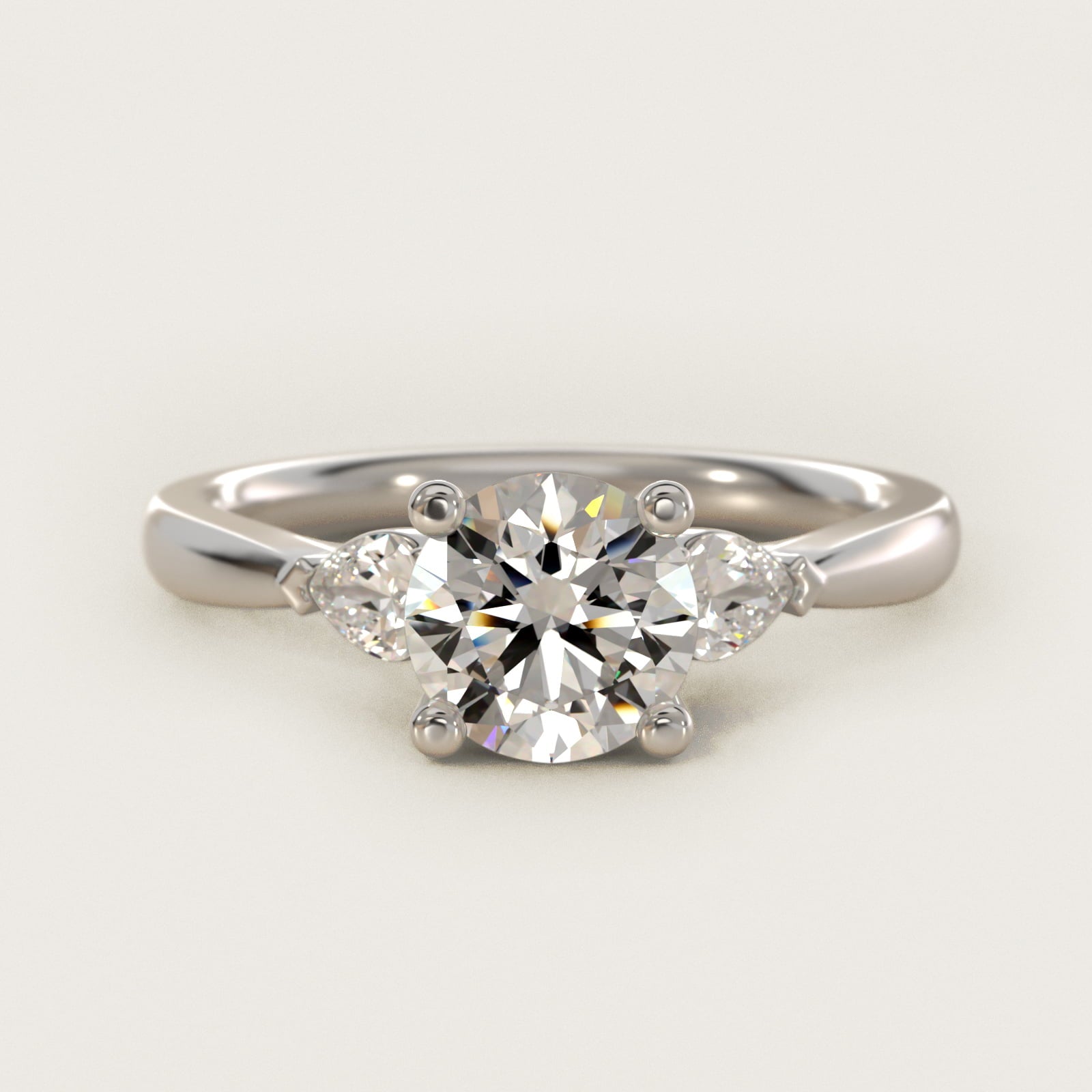 Pear Sidestone Diamond Engagement Ring in Platinum (1/4 ct. tw.) - Round Center