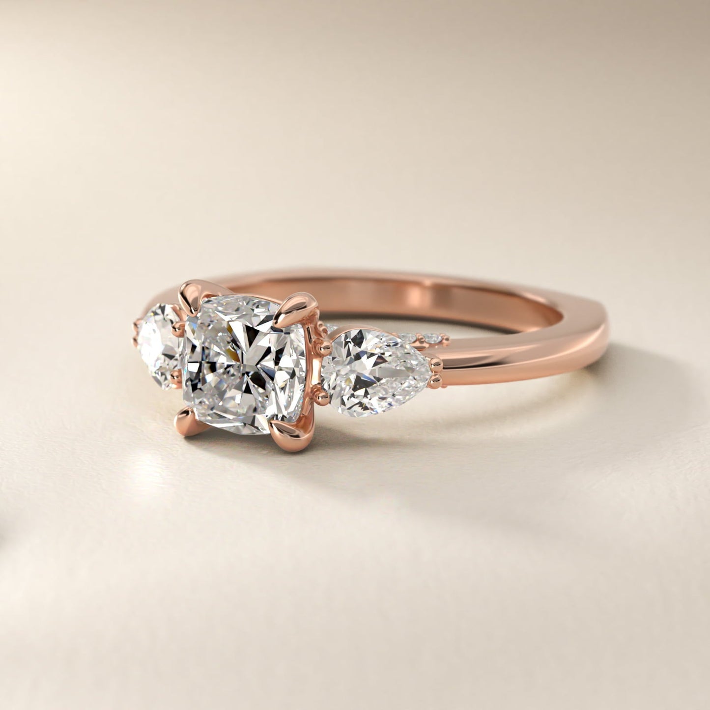 Pear Three Stone Engagement Ring in 18k Rose Gold (5/8 ct. tw.) By Bella Vaughan - Cushion Center