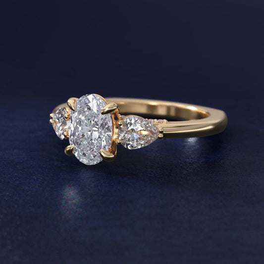 Pear Three Stone Engagement Ring in 18k Yellow Gold (5/8 ct. tw.) By Bella Vaughan - Oval Center