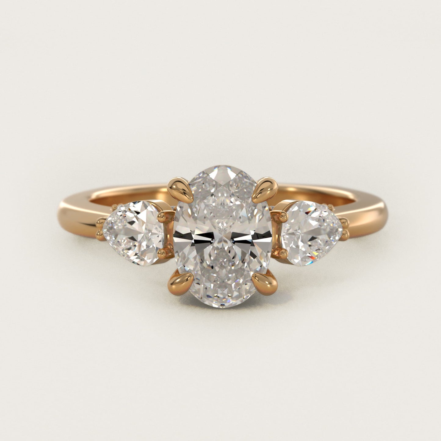 Pear Three Stone Engagement Ring in 14K Yellow Gold (5/8 ct. tw.) By Bella Vaughan - Oval Center