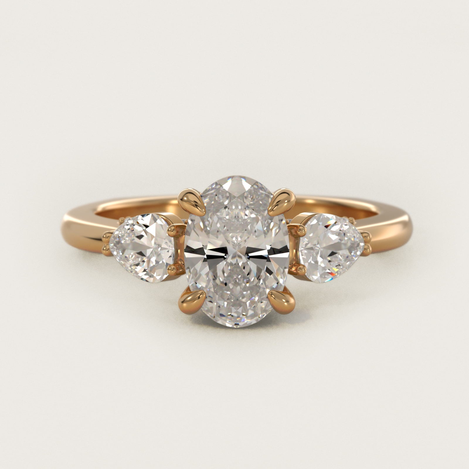 Pear Three Stone Engagement Ring in 14K Yellow Gold (5/8 ct. tw.) By Bella Vaughan - Oval Center
