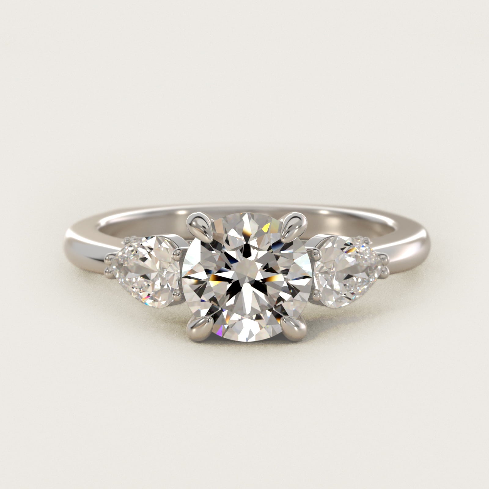 Pear Three Stone Engagement Ring in 14K White Gold (5/8 ct. tw.) By Bella Vaughan - Round Center
