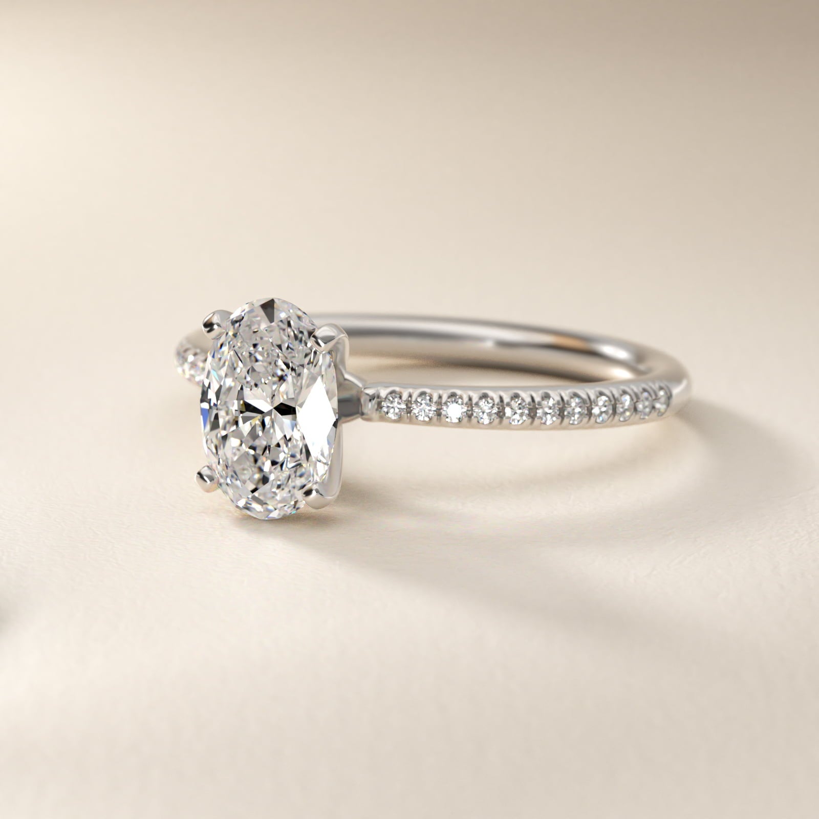 Petite MicropavŽ Diamond Engagement Ring in 18k White Gold (1/10 ct. tw.) - Oval Center