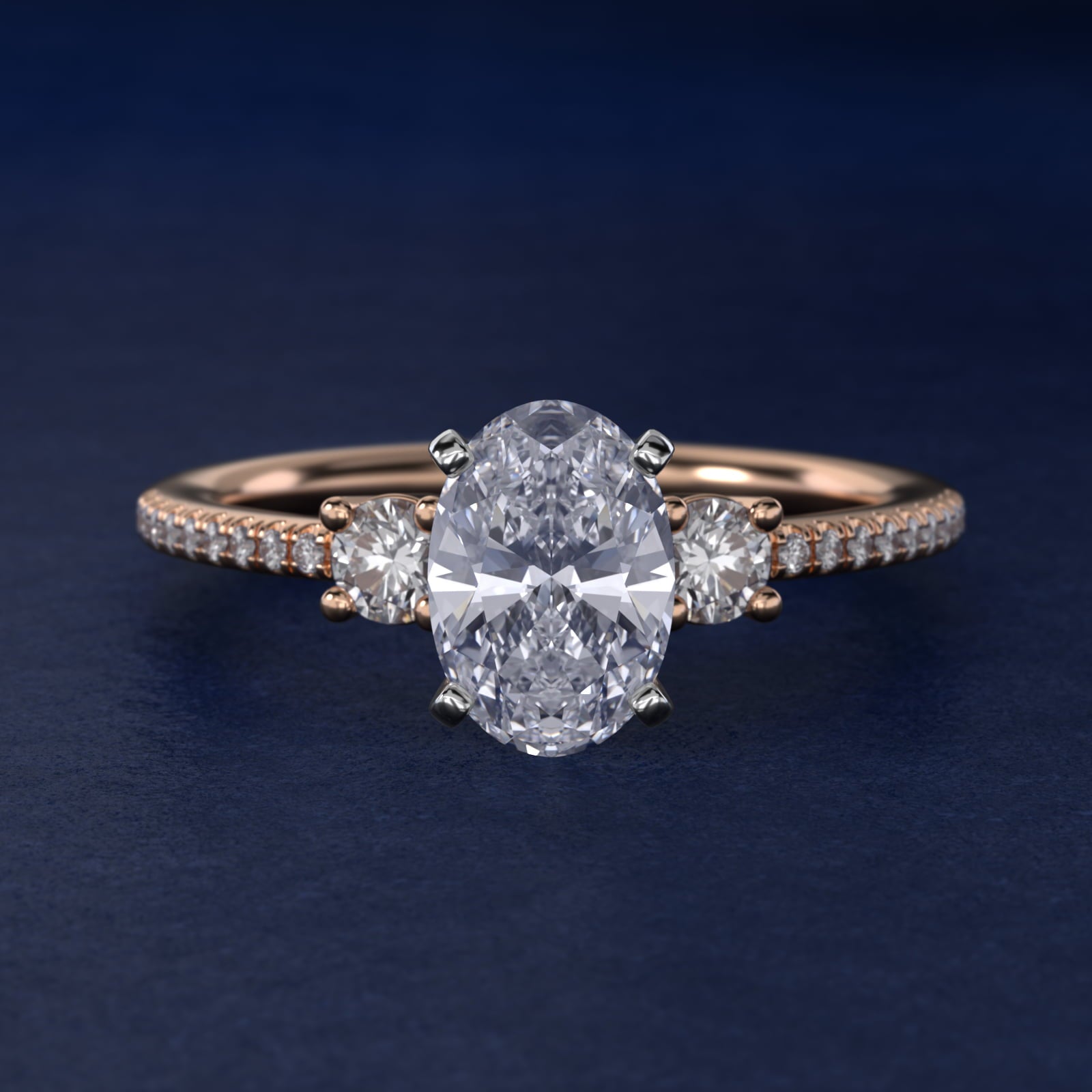 Petite MicropavŽ Trio Diamond Engagement Ring in 14k Rose Gold (1/5 ct. tw.) - Oval Center