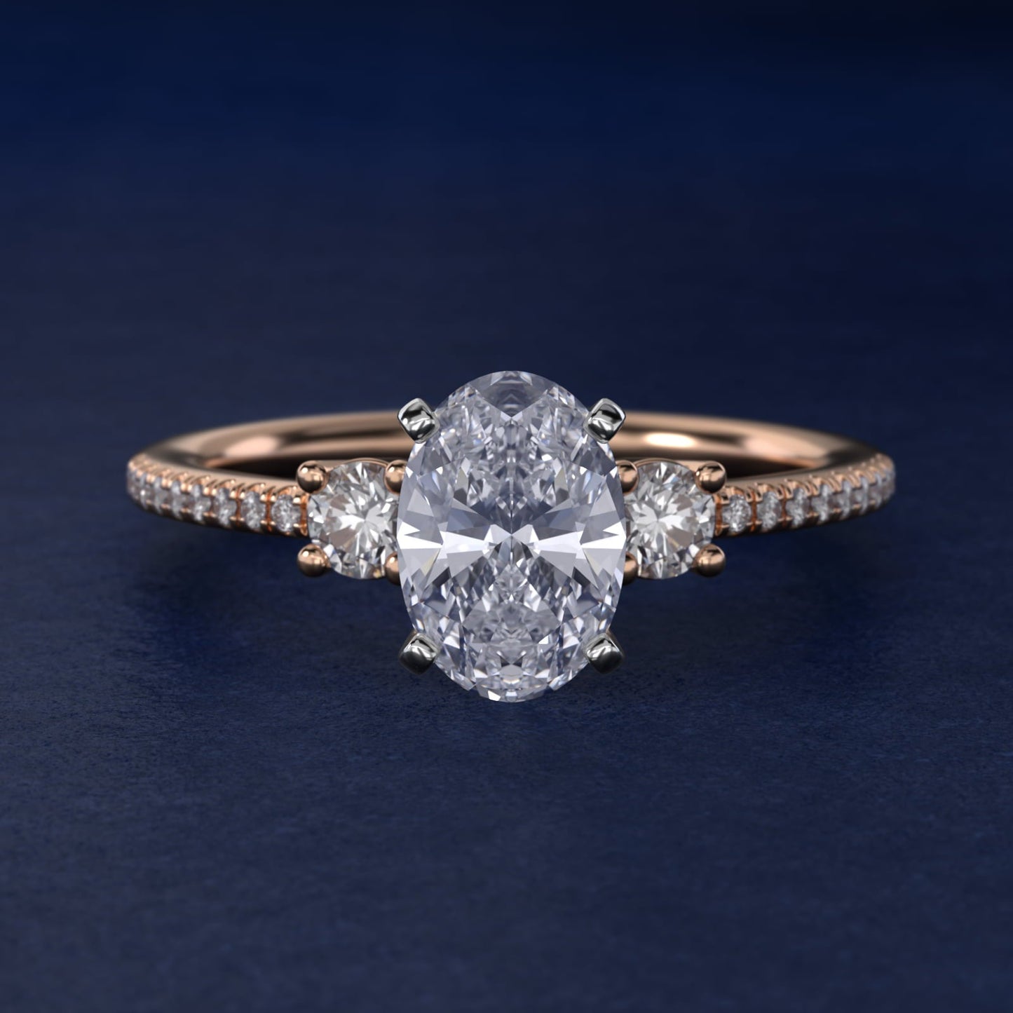 Petite Micropav? Trio Diamond Engagement Ring in 18k Rose Gold (1/5 ct. tw.) - Oval Center