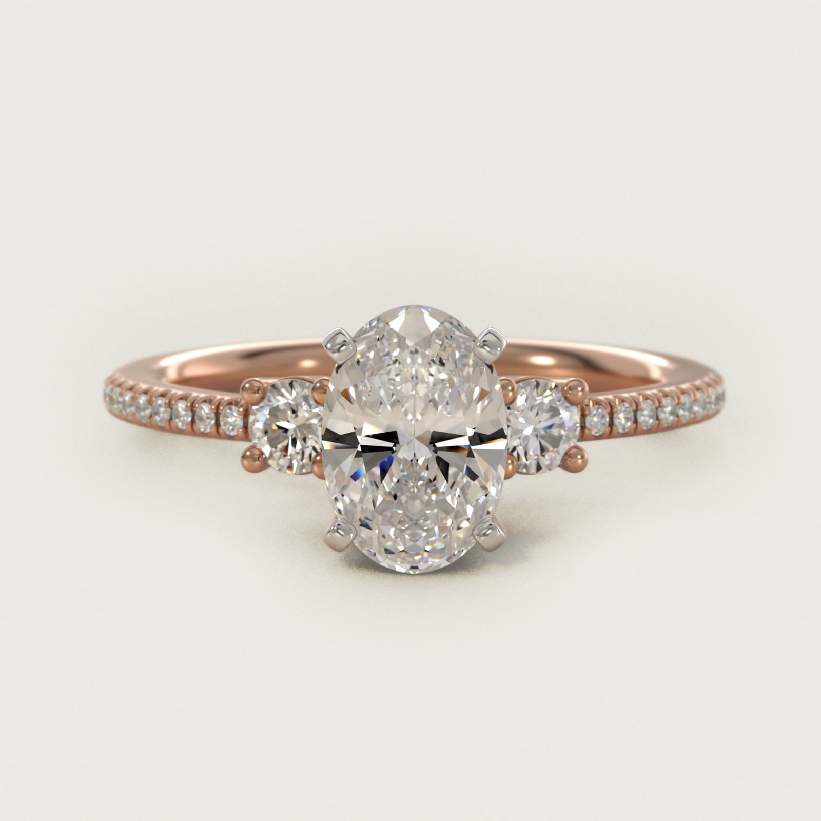 Petite Micropav? Trio Diamond Engagement Ring in 18k Rose Gold (1/5 ct. tw.) - Oval Center