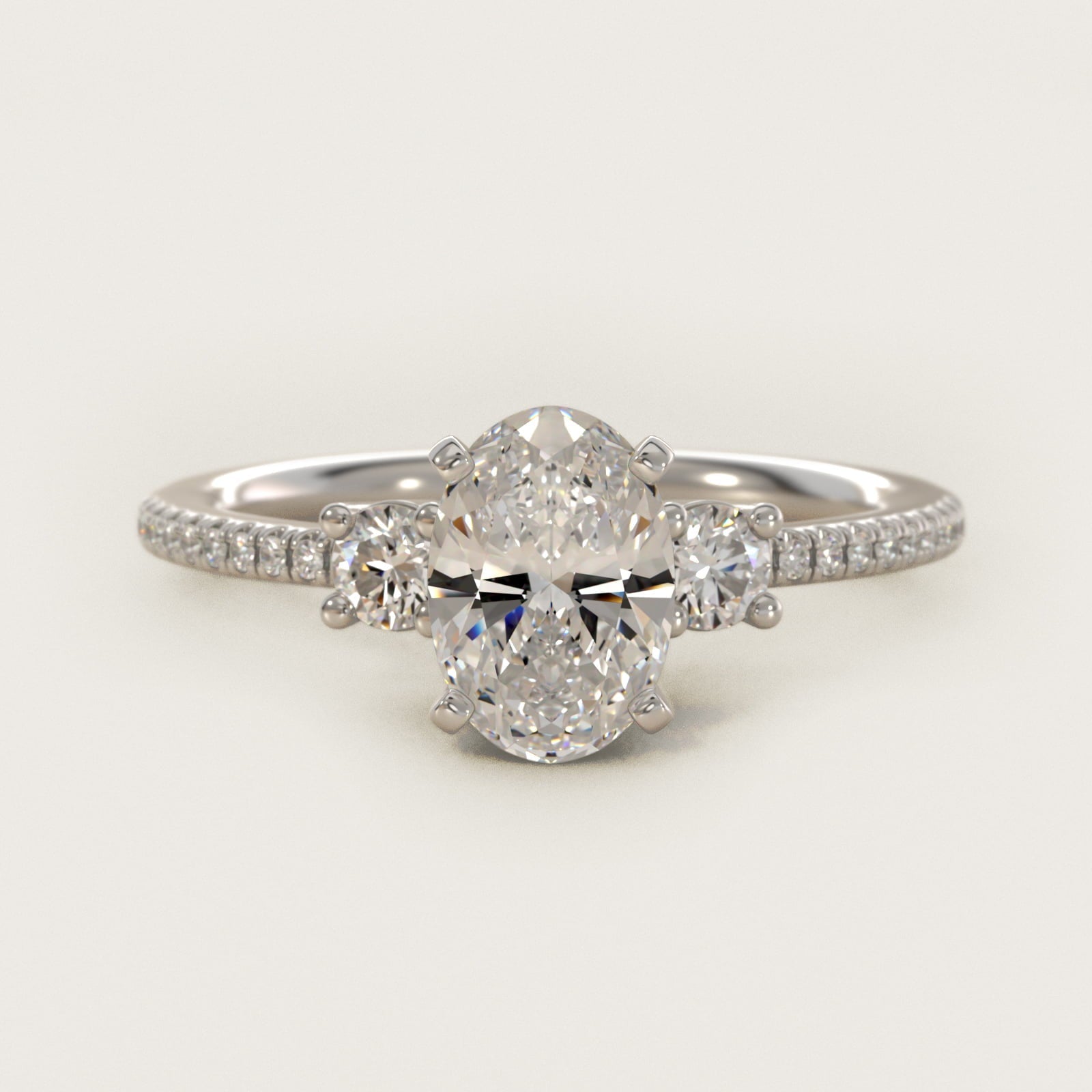 Petite Micropav? Trio Diamond Engagement Ring in Platinum (1/5 ct. tw.) - Oval Center