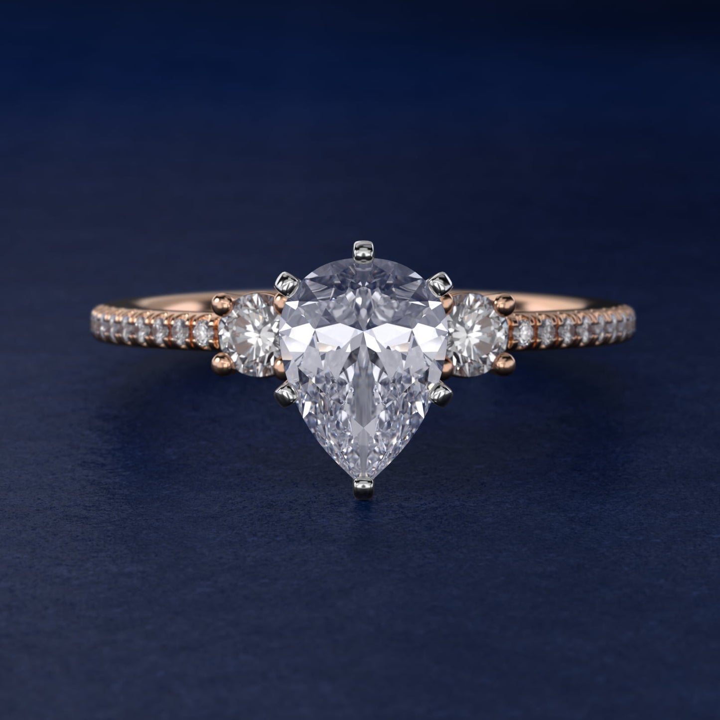Petite MicropavŽ Trio Diamond Engagement Ring in 14k Rose Gold (1/5 ct. tw.) - Pear Center
