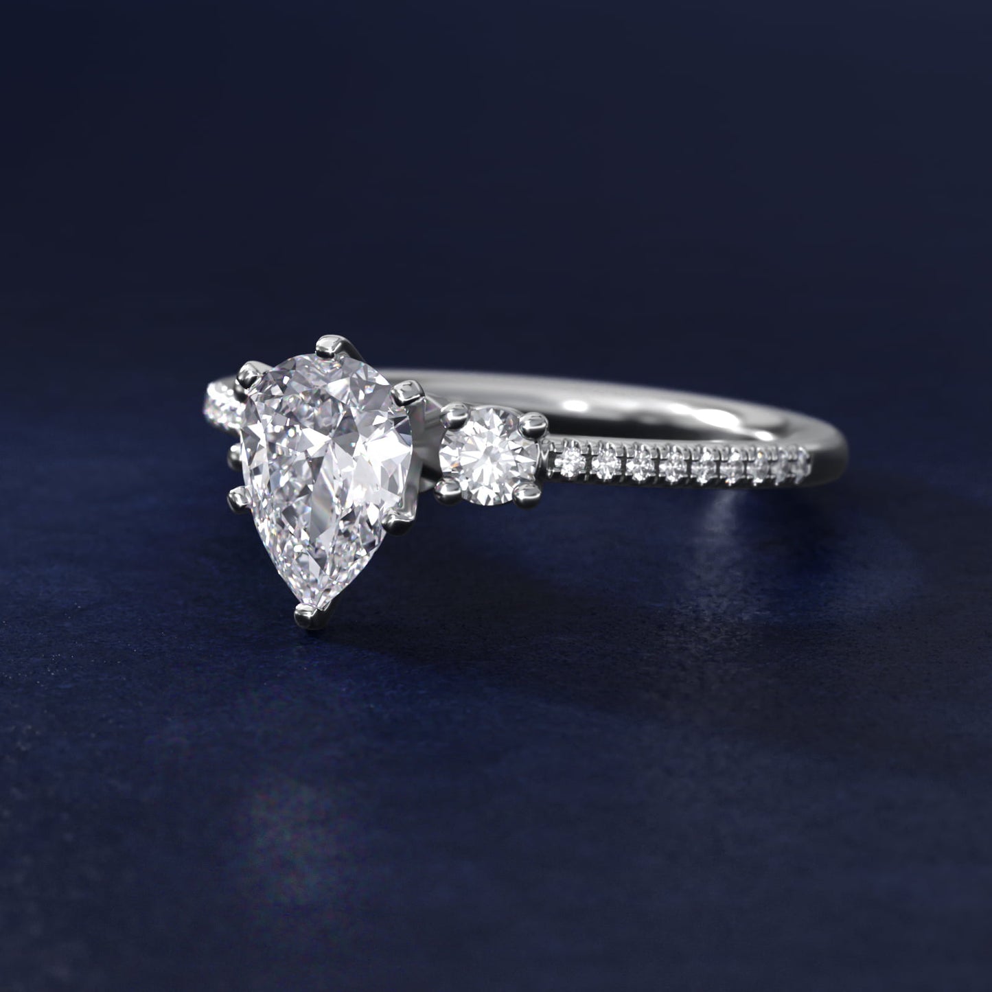 Petite MicropavŽ Trio Diamond Engagement Ring in 14k White Gold (1/5 ct. tw.) - Pear Center