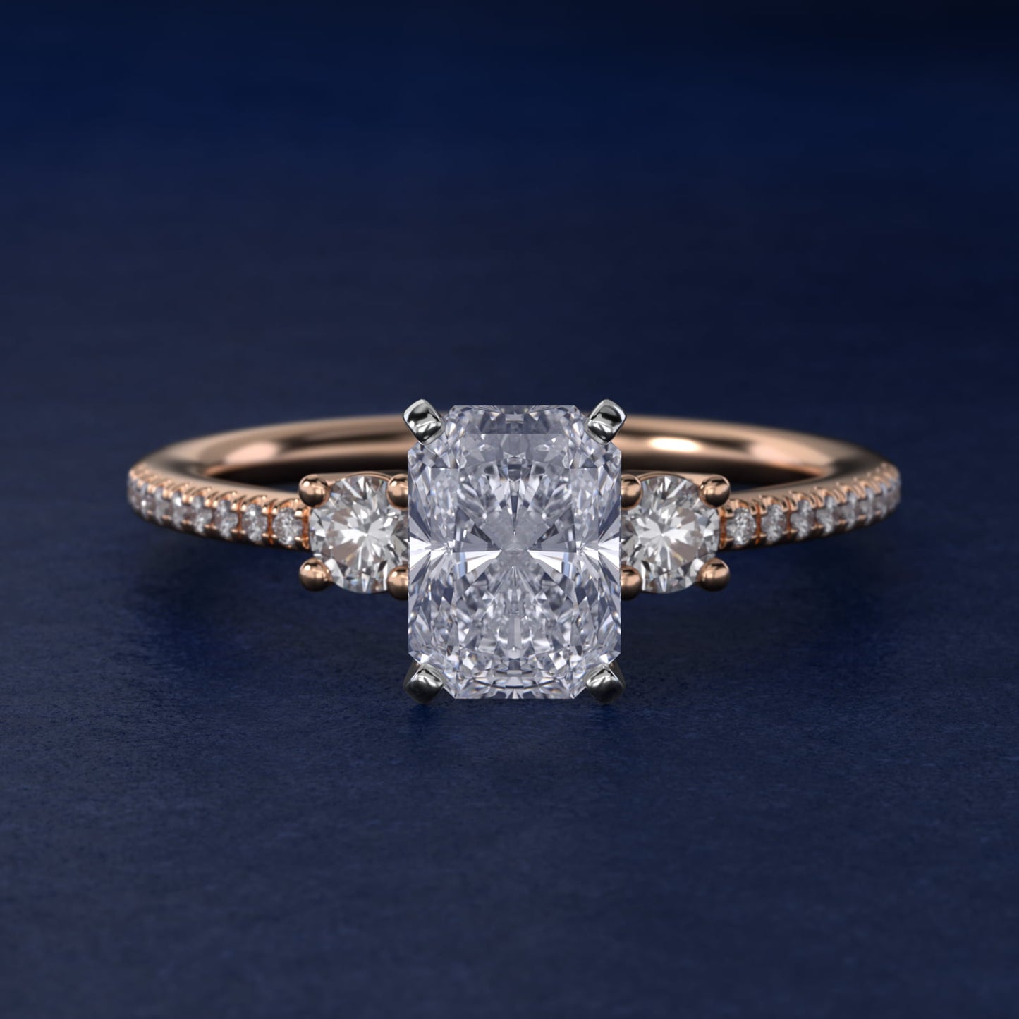 Petite MicropavŽ Trio Diamond Engagement Ring in 14k Rose Gold (1/5 ct. tw.) - Radiant Center
