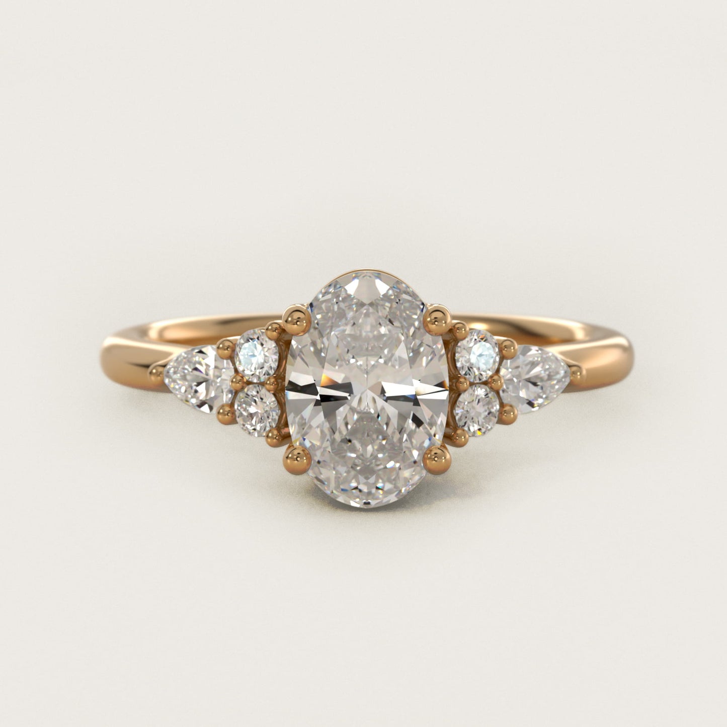 Petite Pear and Round Diamond Engagement Ring in 14k Yellow Gold (1/4 ct. tw.) - Oval Center