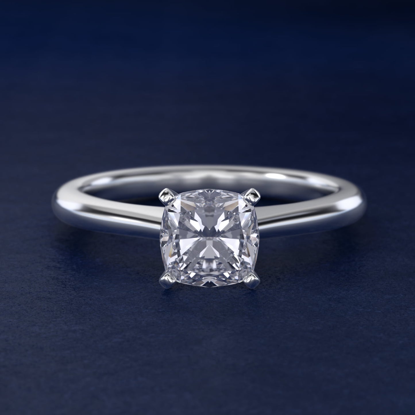 Petite Solitaire Engagement Ring in Platinum - Cushion Center
