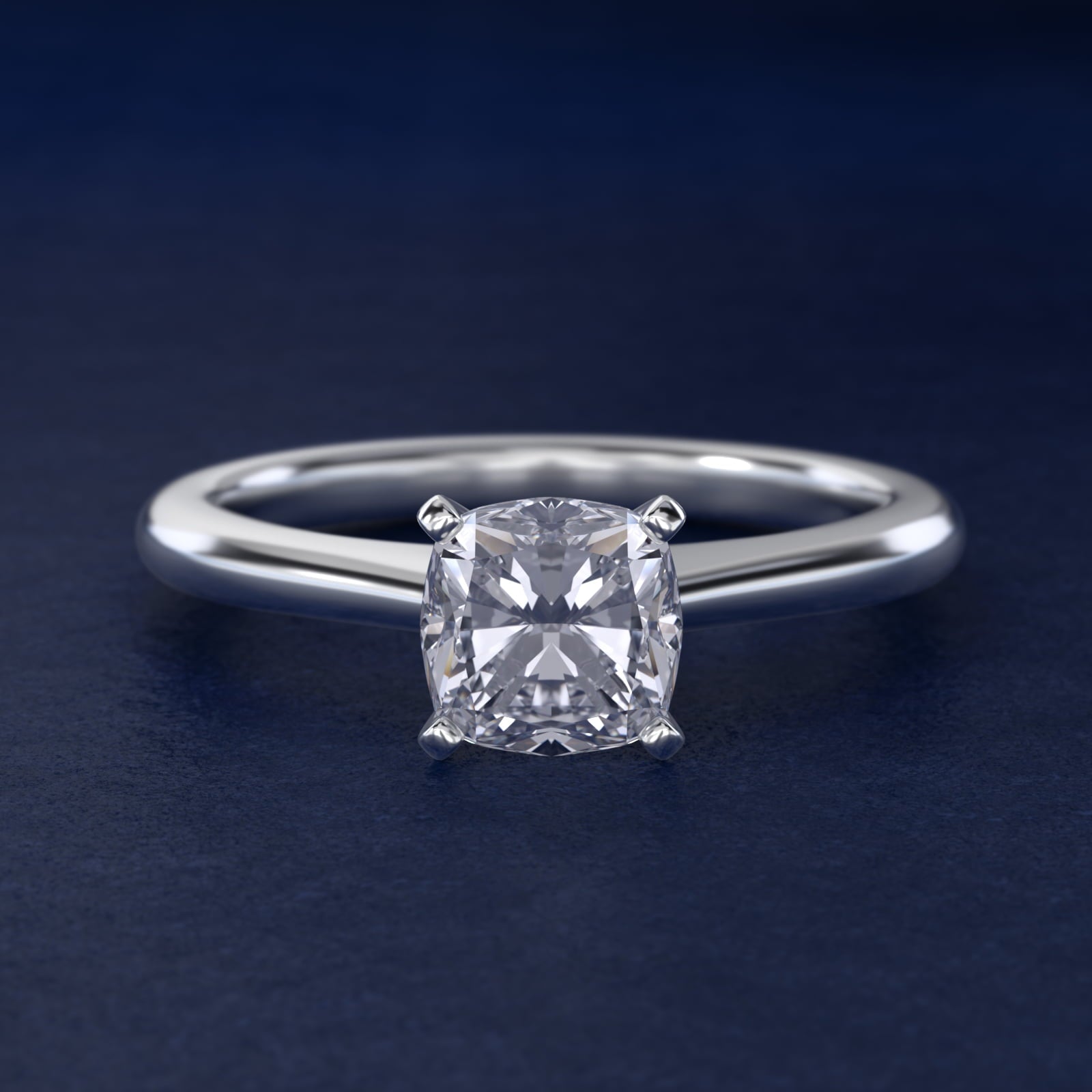 Petite Solitaire Engagement Ring in Platinum - Cushion Center