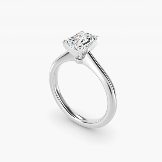 Petite Solitaire Engagement Ring in Platinum - Emerald Center
