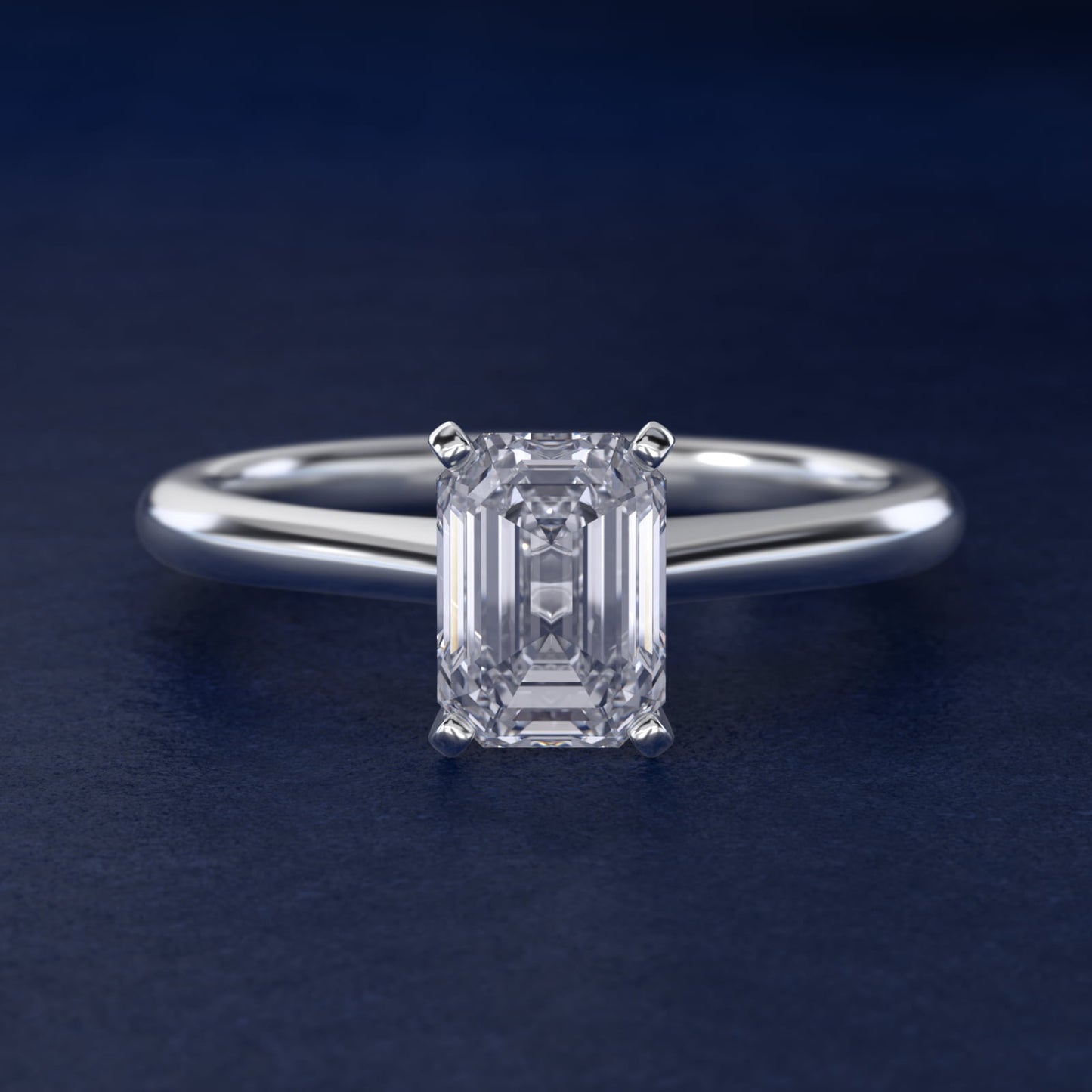 Petite Solitaire Engagement Ring in Platinum - Emerald Center