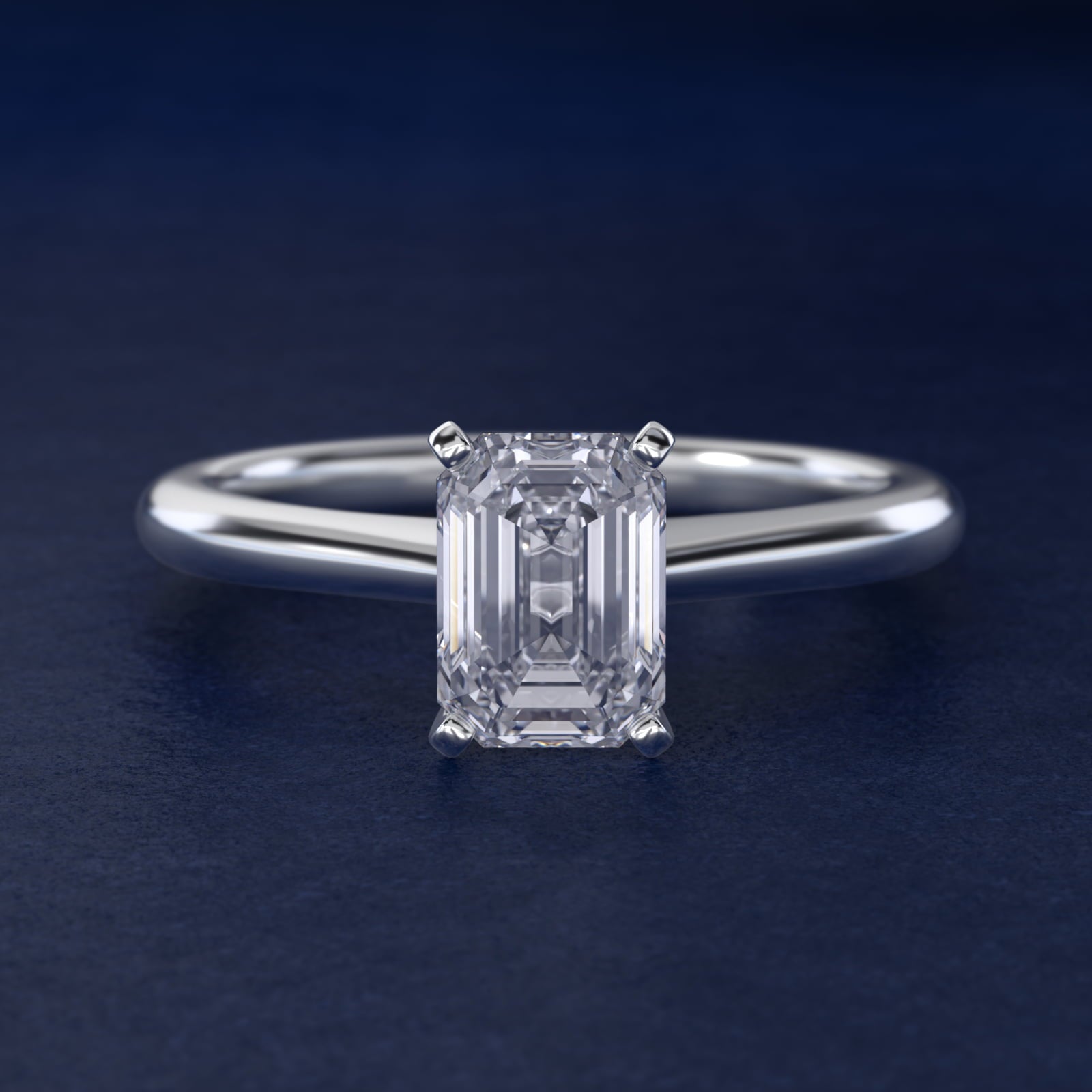 Petite Solitaire Engagement Ring in Platinum - Emerald Center