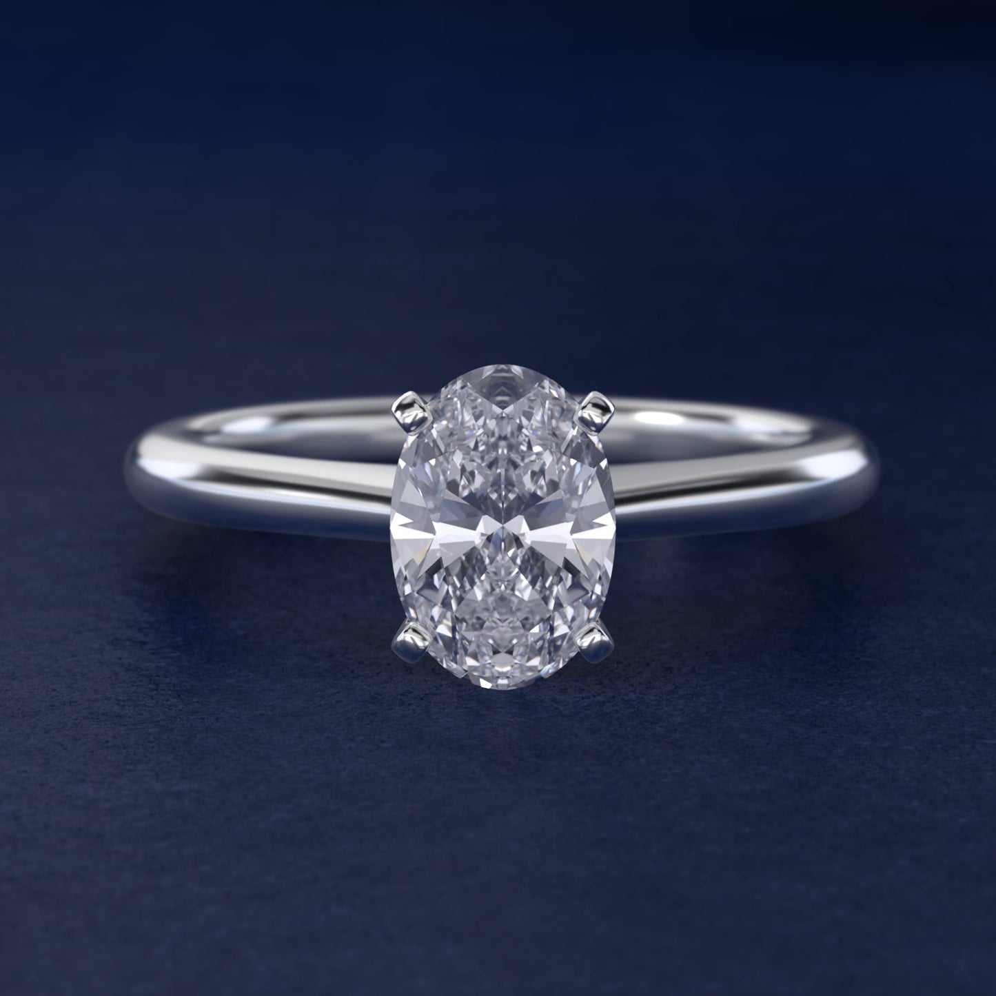 Petite Solitaire Engagement Ring in Platinum - Oval Center
