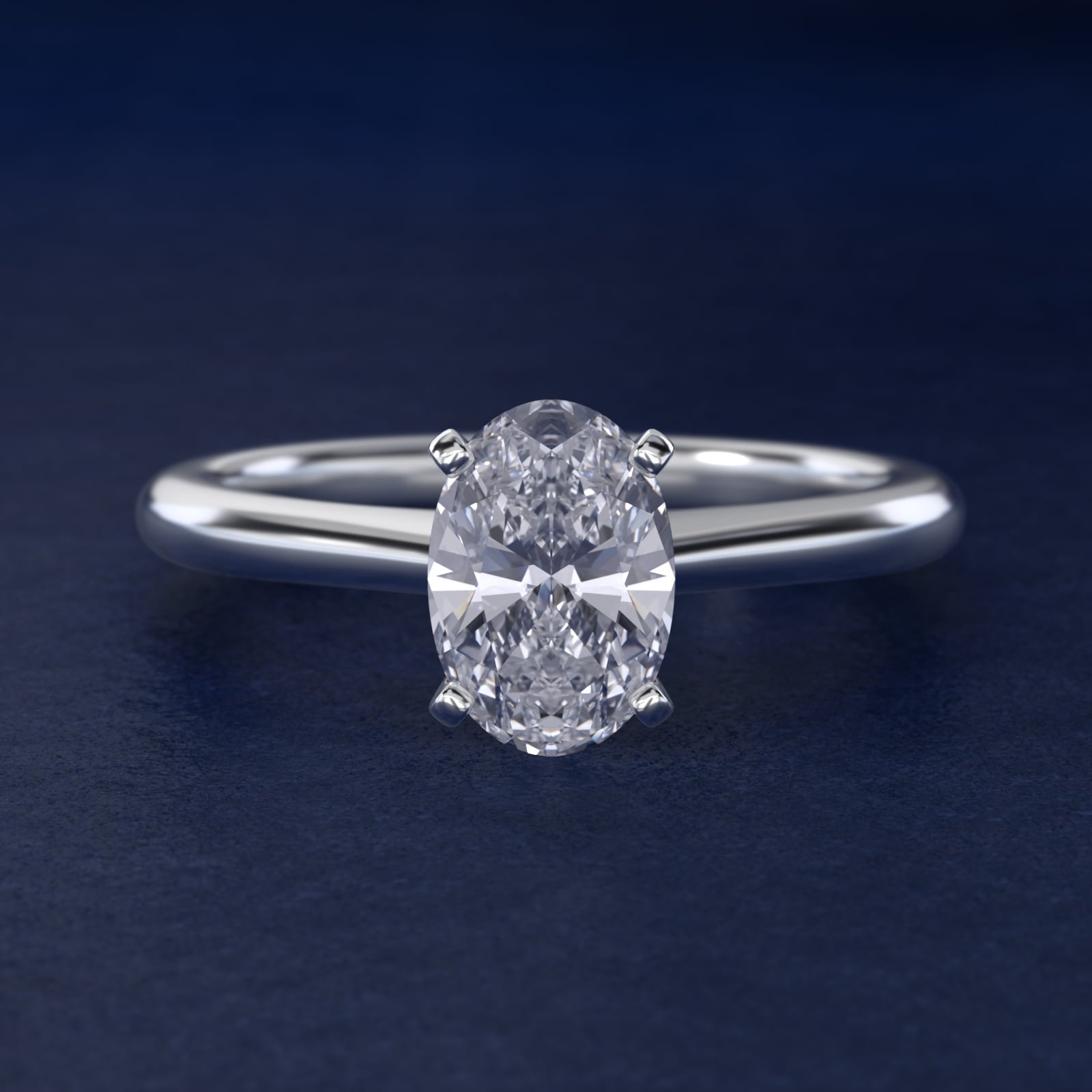Petite Solitaire Engagement Ring in Platinum - Oval Center