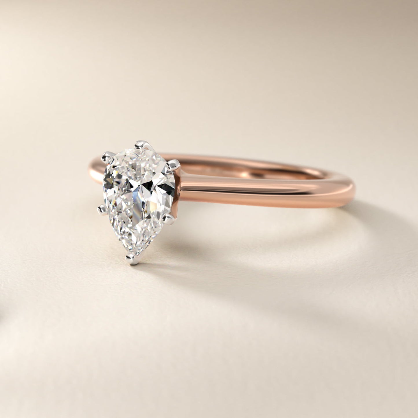 Petite Solitaire Engagement Ring in 18k Rose Gold - Pear Center