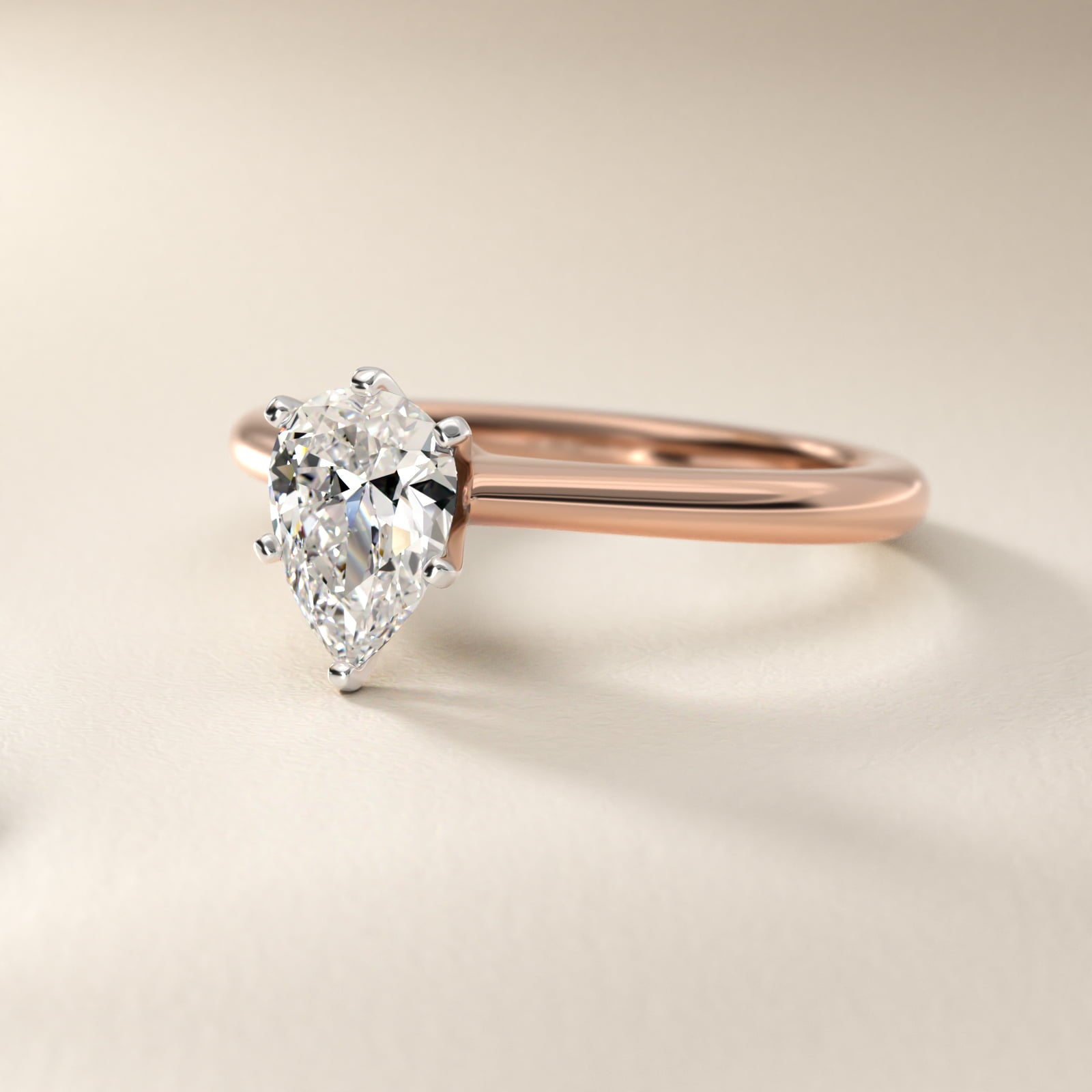 Petite Solitaire Engagement Ring in 18k Rose Gold - Pear Center