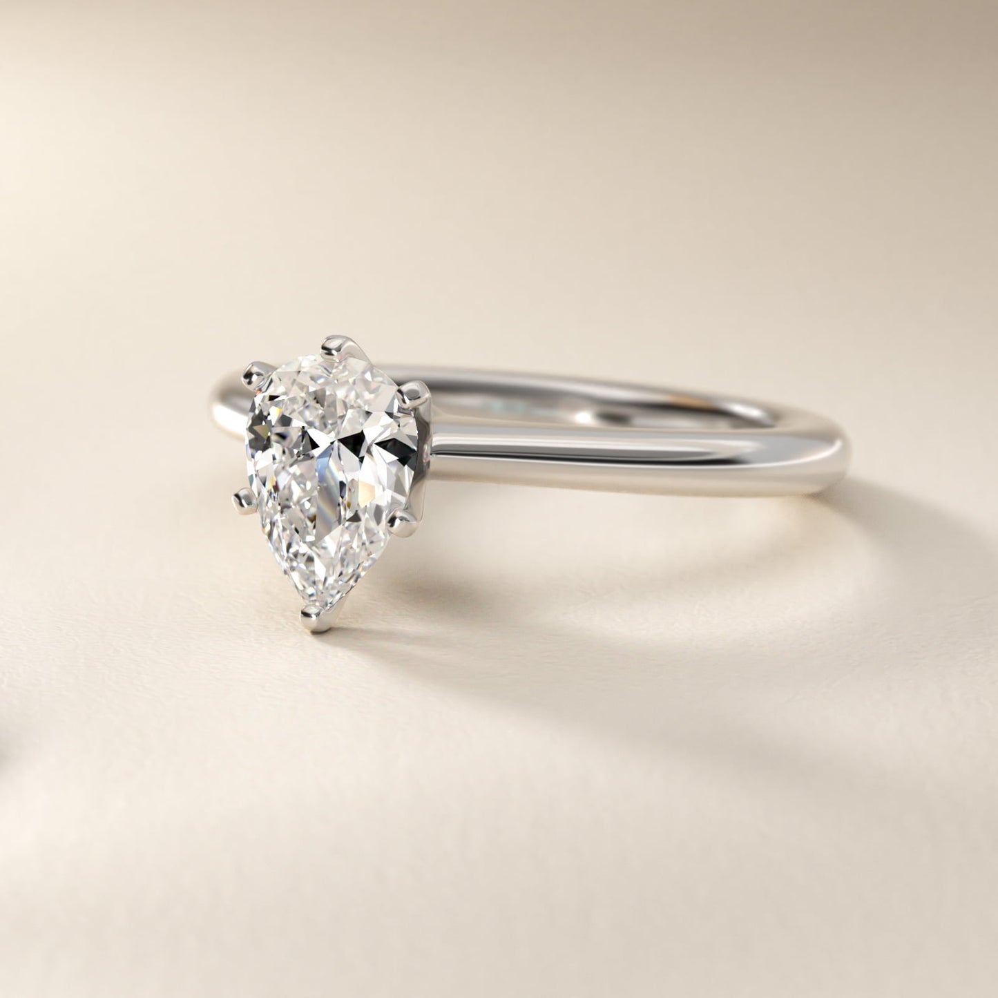 Petite Solitaire Engagement Ring in 14k White Gold - Pear Center