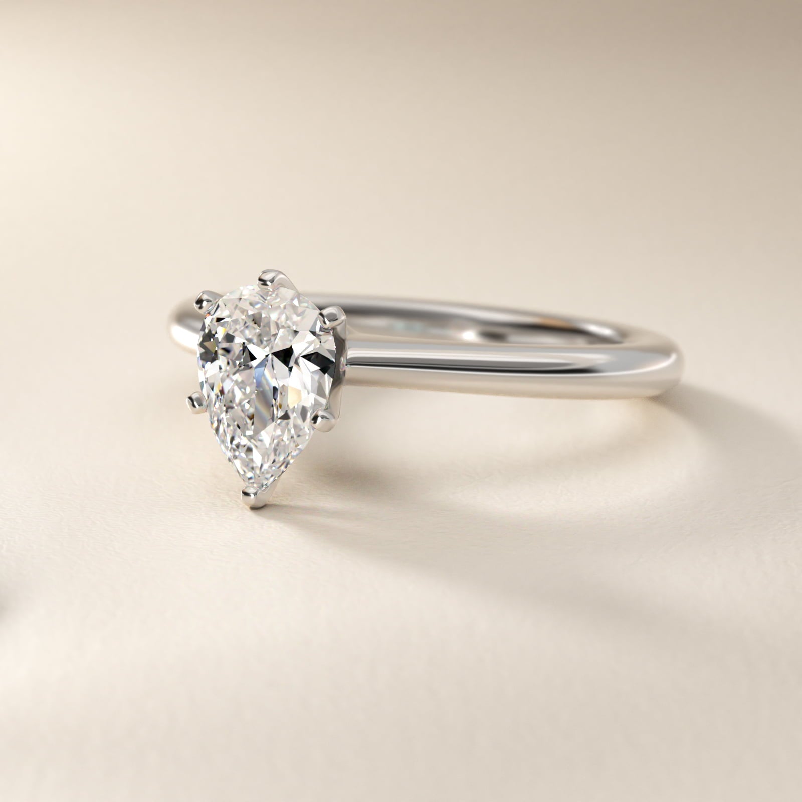 Petite Solitaire Engagement Ring in 14k White Gold - Pear Center
