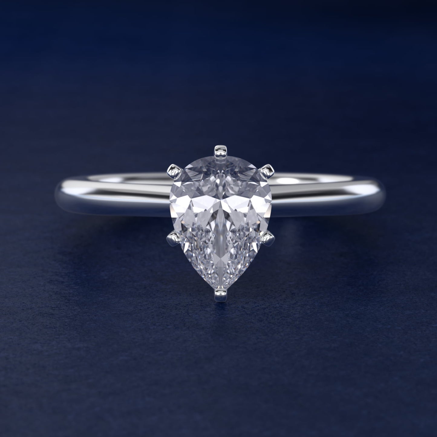 Petite Solitaire Engagement Ring in Platinum - Pear Center